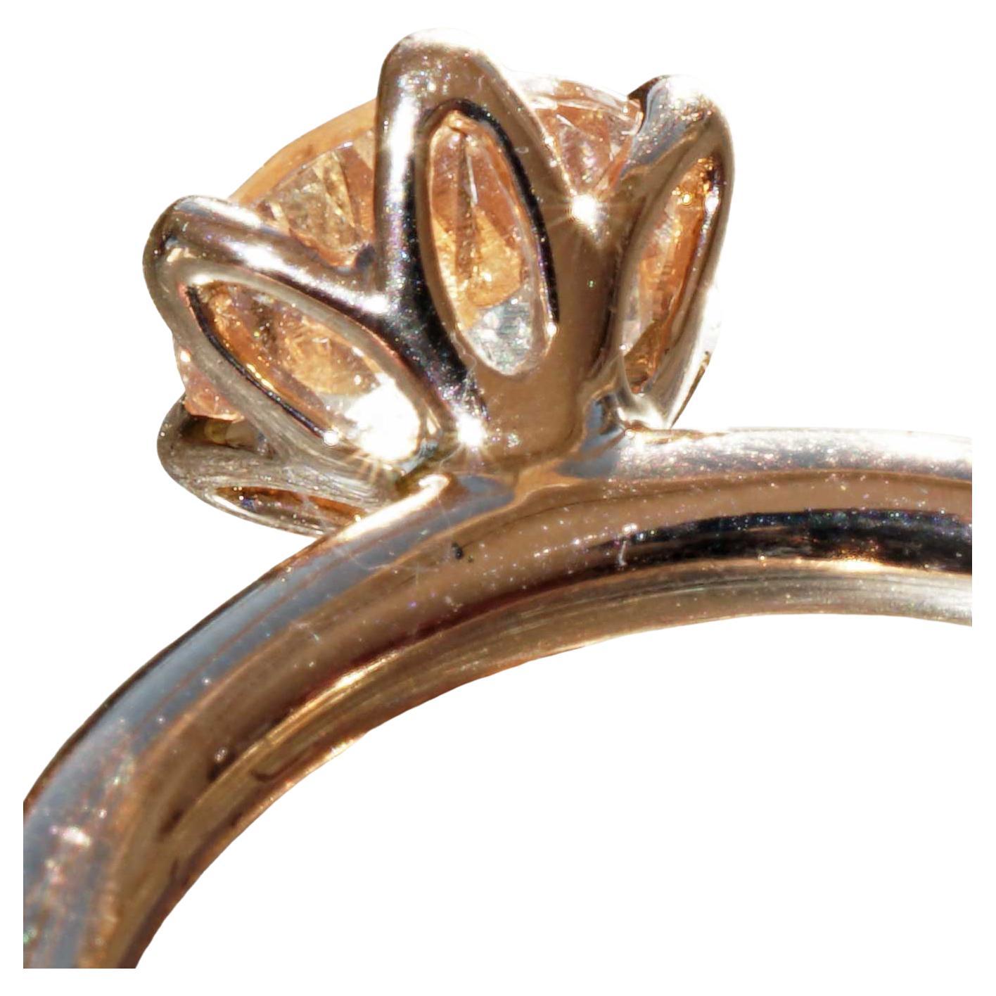 finest goldsmith's work from Italy combination ring with a round faceted morganite of 7 mm, perfectly cut for a lot of brilliance, fashionable undercarriage made of crown-shaped loops, 6 crabs, fashionable round band, 2 mm diameter, weighing approx.
