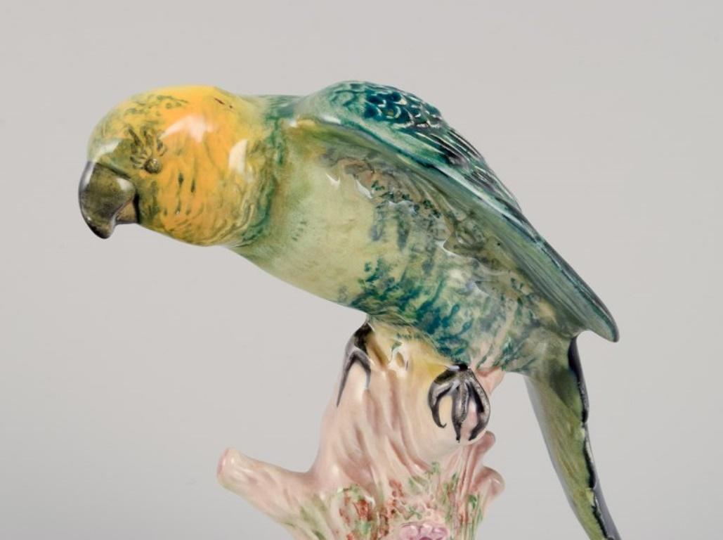 Beswick, England. Porcelain figurine of a parrot. Hand-painted.
Approximately 1930s/1940s.
Model number 930.
Marked.
Perfect condition with natural crazing.
Dimensions: Width 13.0 cm x Depth 8.0 cm x Height 15.0 cm.