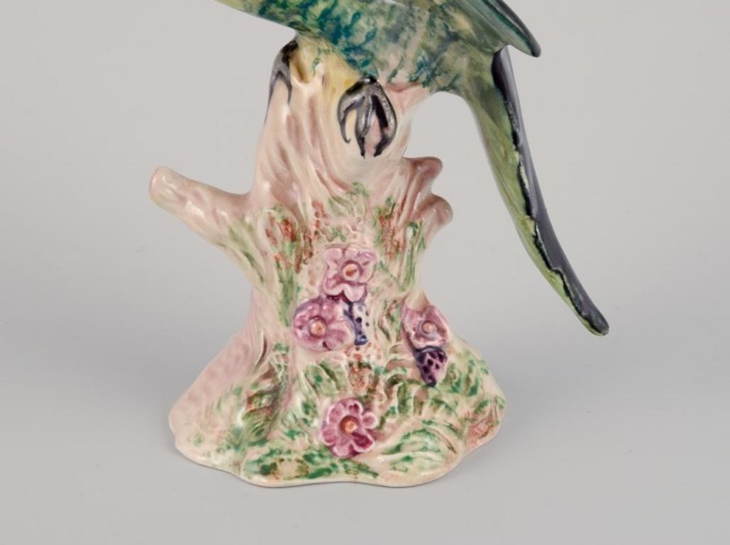 Porcellana Beswick, Inghilterra. Statuetta in porcellana di un pappagallo. Circa anni '30/'40 in vendita