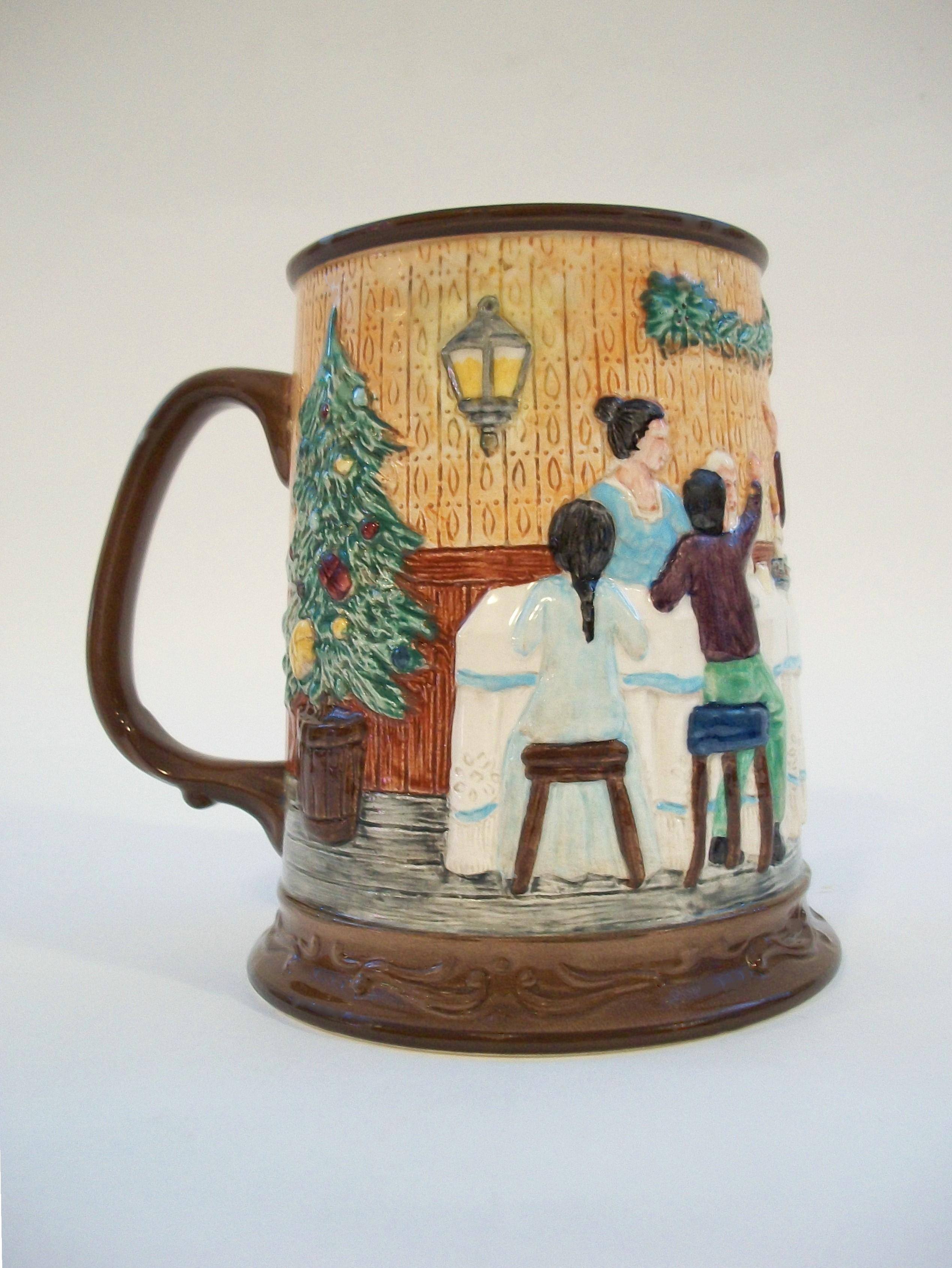 JOHN BESWICK LIMITED (Manufacturer) - The Christmas Carol, Charles Dickens (Pattern) - Collectors International Limited Edition 617/15,000 - Vintage ceramic Christmas mug - featuring hand painted decoration over the mold formed body - signed on the