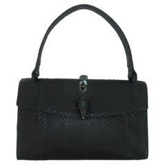 BETH LEVINE Black Snakeskin Handbag With Carved Stone Closure