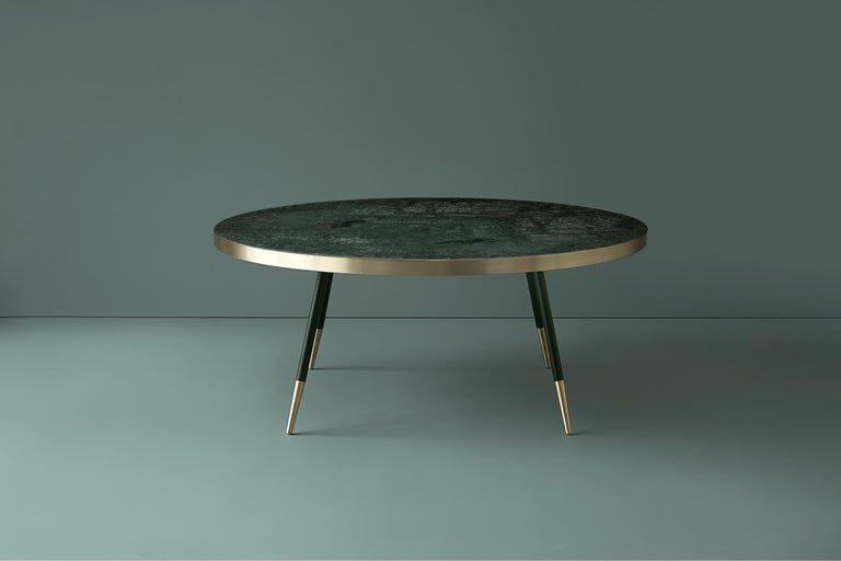 Bethan Gray has been inspired by pairing the natural beauty of colored marble together with warm brushed brass to
create her Band range of tables. For this range, solid marble is encased in a warm and elegant metallic rim to bring a
distinctive,