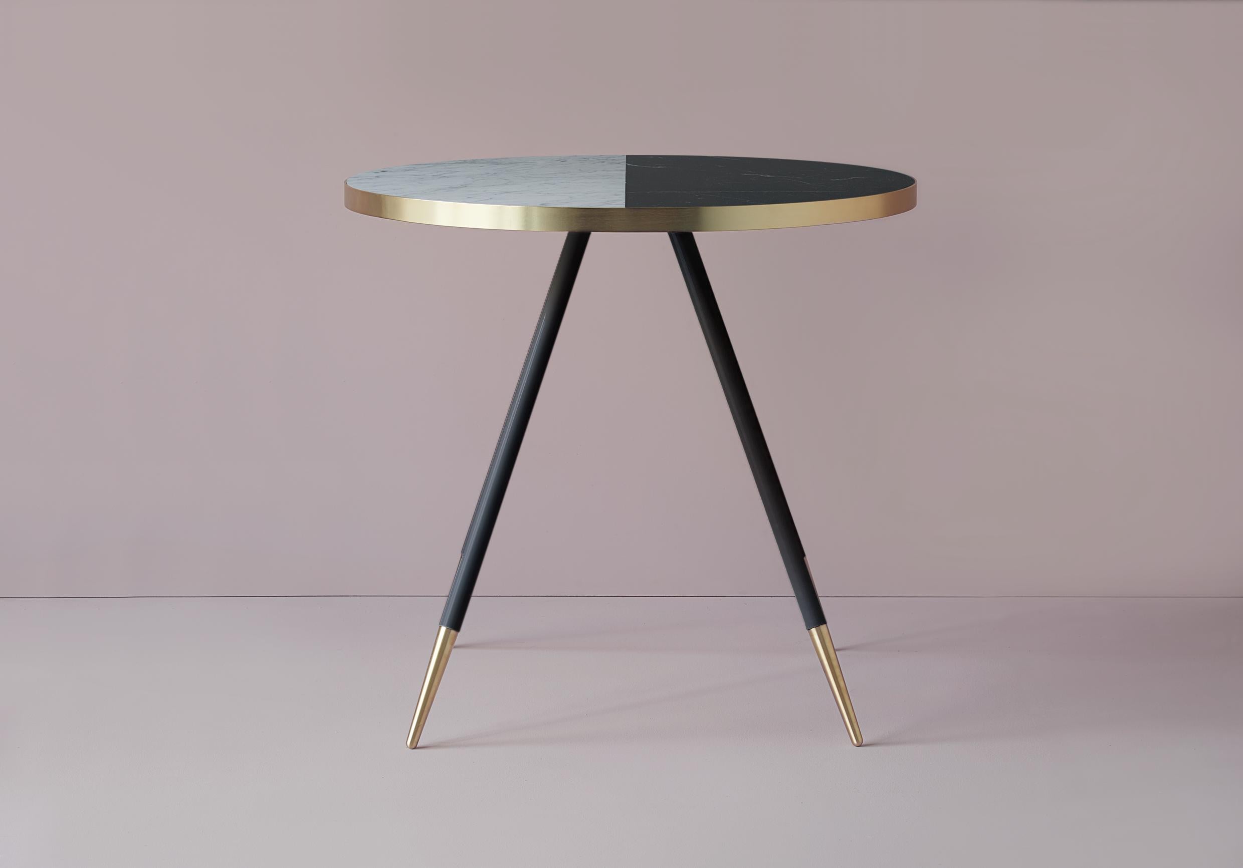 Bethan Gray has been inspired by pairing the natural beauty of colored marble together with warm brushed brass to
create her Band range of tables. For this range, solid marble is encased in a warm and elegant metallic rim to bring a
distinctive,