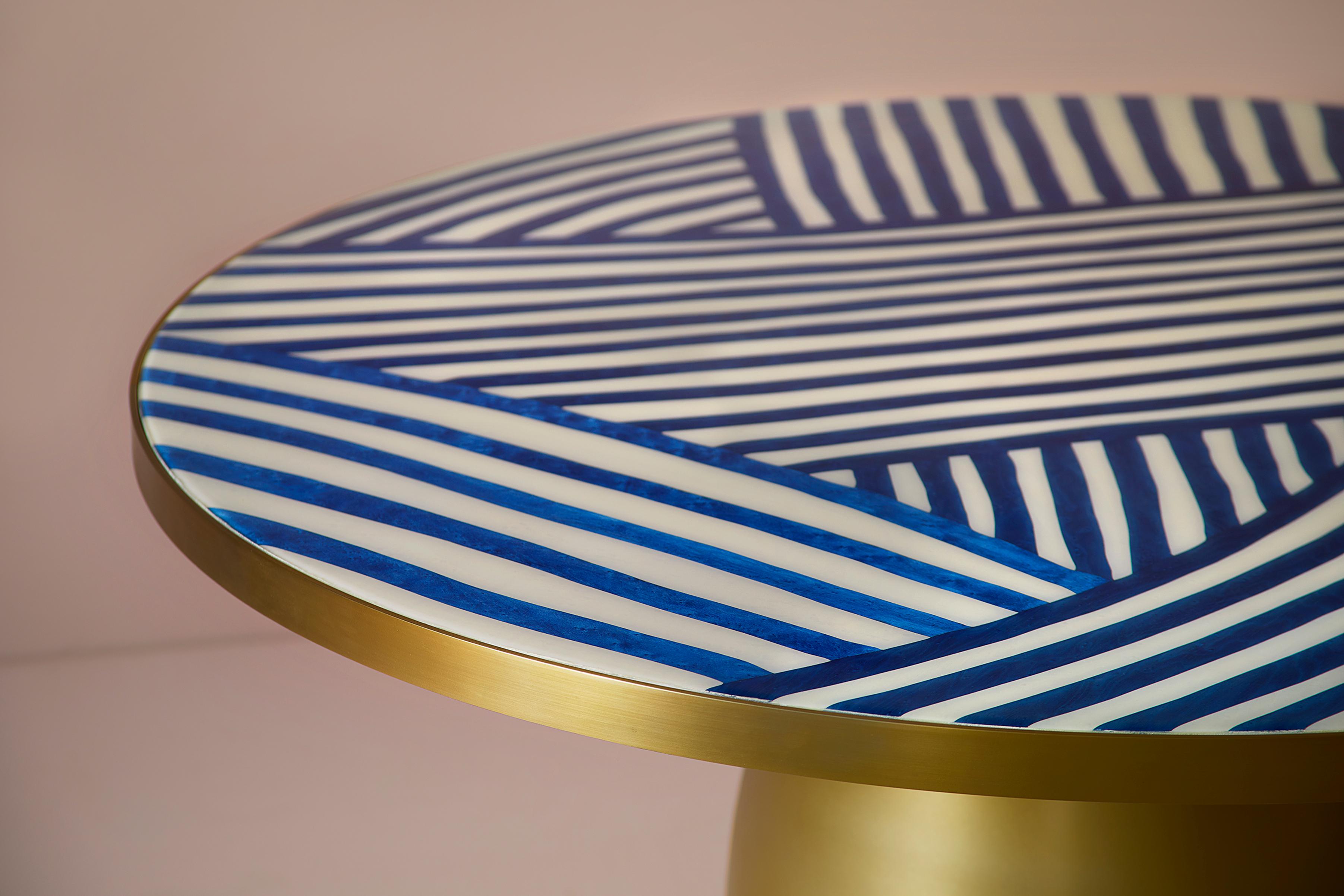 Craft :
Working with master craftsman Shamsian, Bethan’s long term craft partner, the Inky Dhow Lustre side table top is made from laser cut pieces of hand dyed bird’s eye maple veneer, specifically chosen for the way the grain and finish intimates