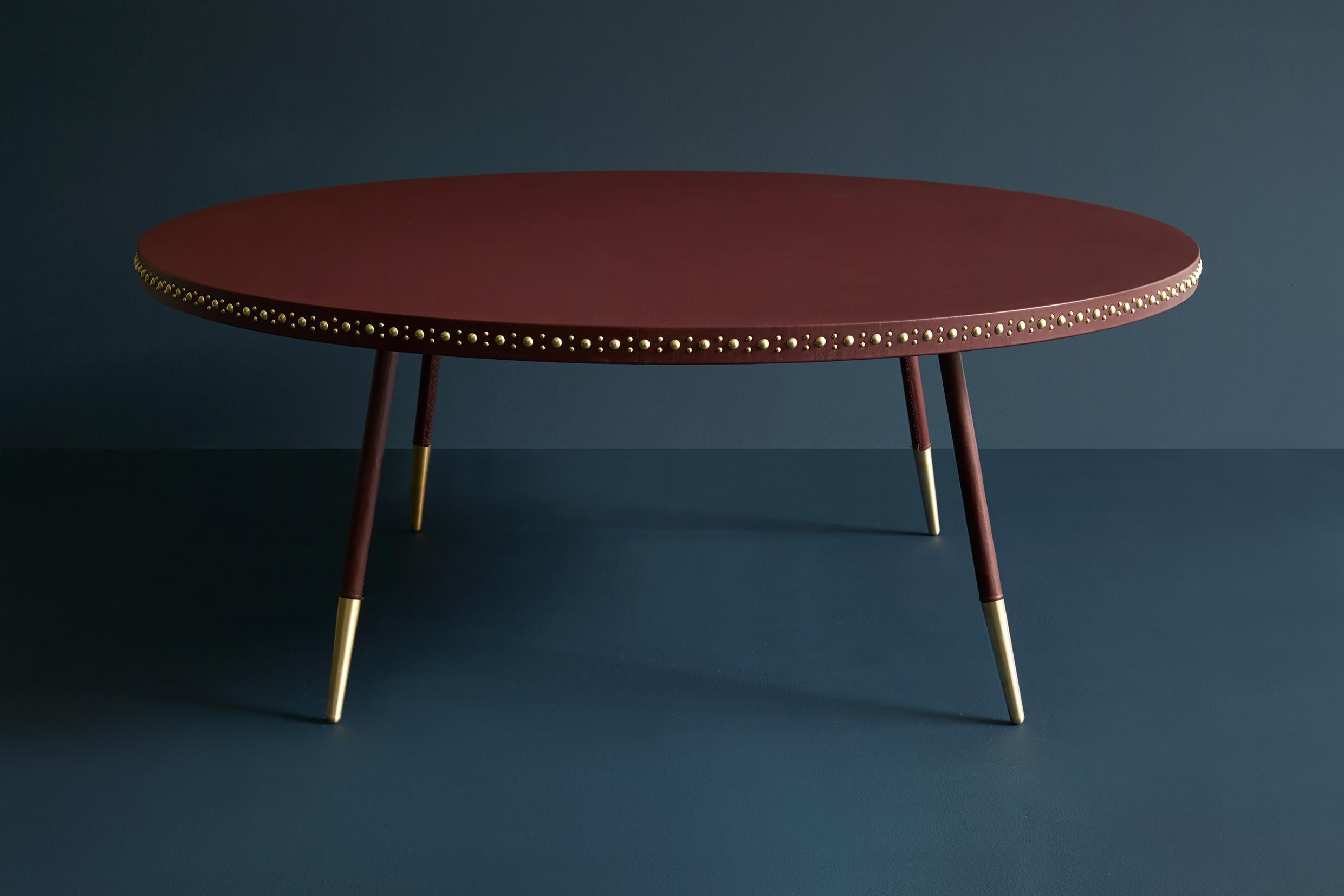 Bethan Gray has taken inspiration from the stud work found on Asian and Arabic doors to develop the aesthetic on her
Stud range of tables. Studding was traditionally used to join two materials together, such as leather or wood, and was
later used