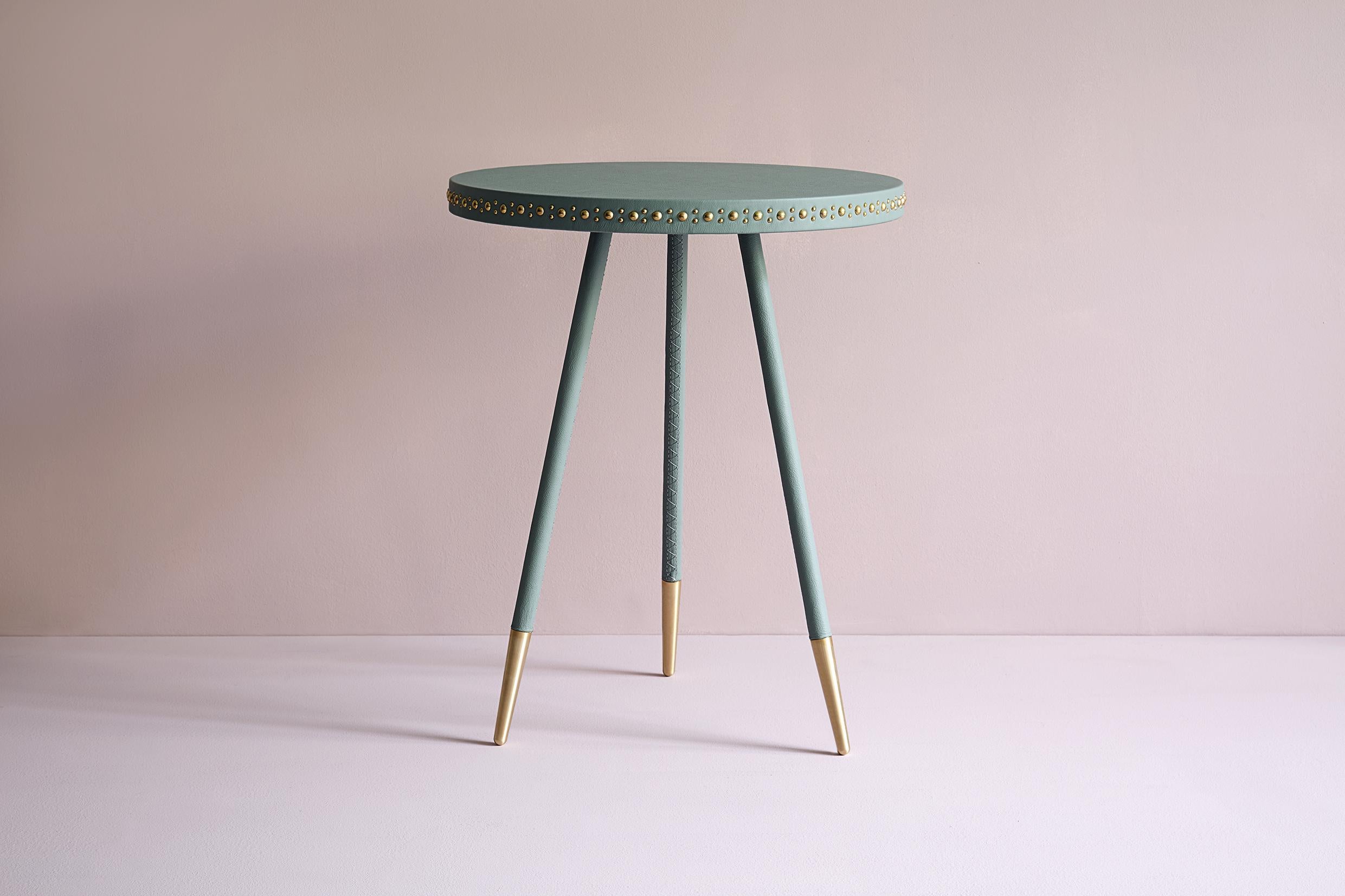 Bethan Gray has taken inspiration from the stud work found on Asian and Arabic doors to develop the aesthetic on her
Stud range of tables. Studding was traditionally used to join two materials together, such as leather or wood, and was
later used