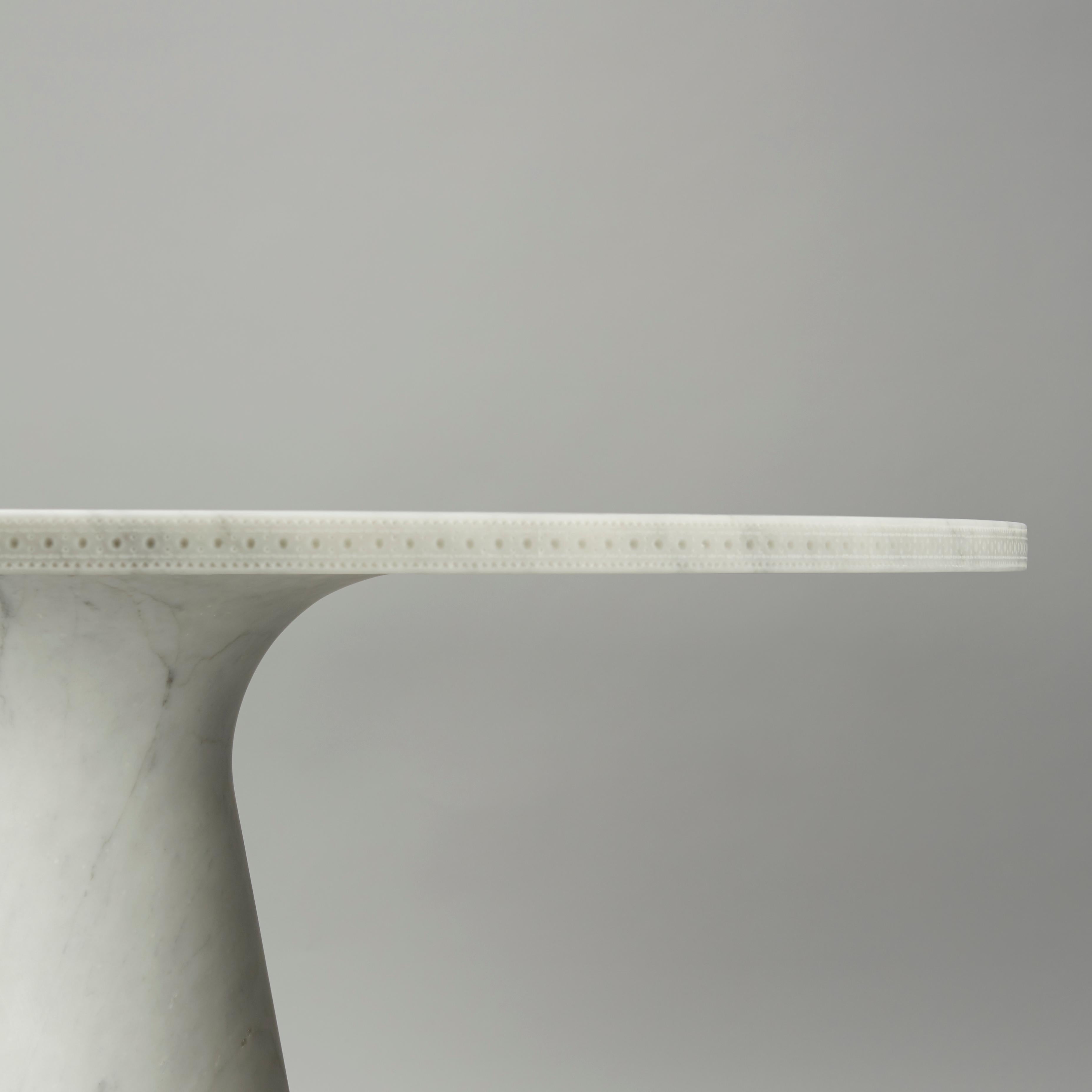 The all marble Brogue table is a variation on one of Bethan's hallmark creations. Here the design is translated into solid Carrara marble and includes the complex brogueing detail precisely carved by state of the art machinery, then hand finished by