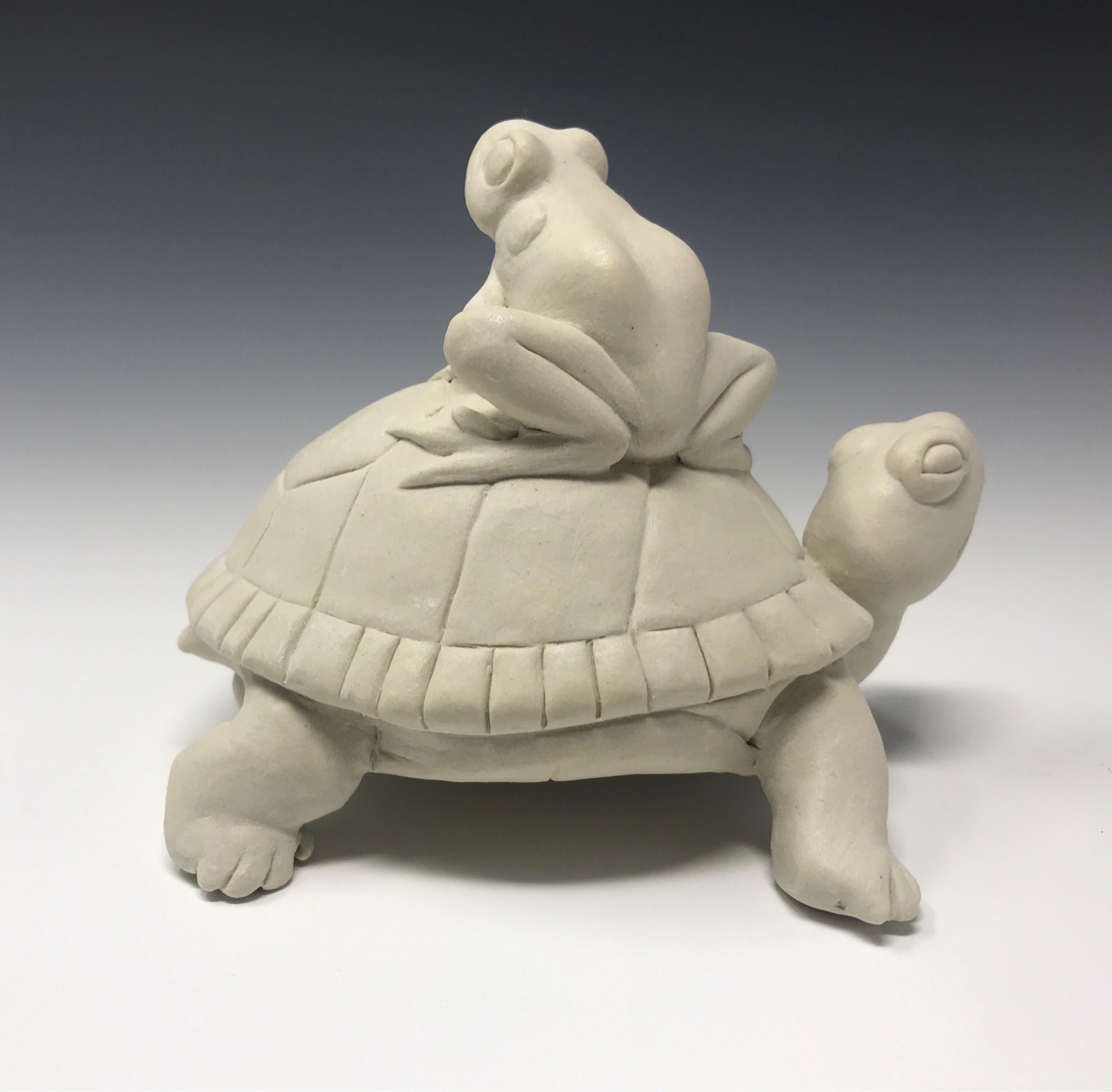 This hand built ceramic frog and turtle pairing was hand sculpted without the use of molds by New York artist, Bethany Krull.  The study of reptilian and amphibian form is also a commentary on solidarity amidst diversity. A study for a larger