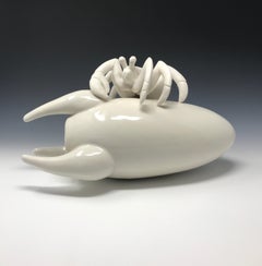 Porcelain hermit crab on a toy rocket “Starter Pet Adaptation” by Bethany Krull