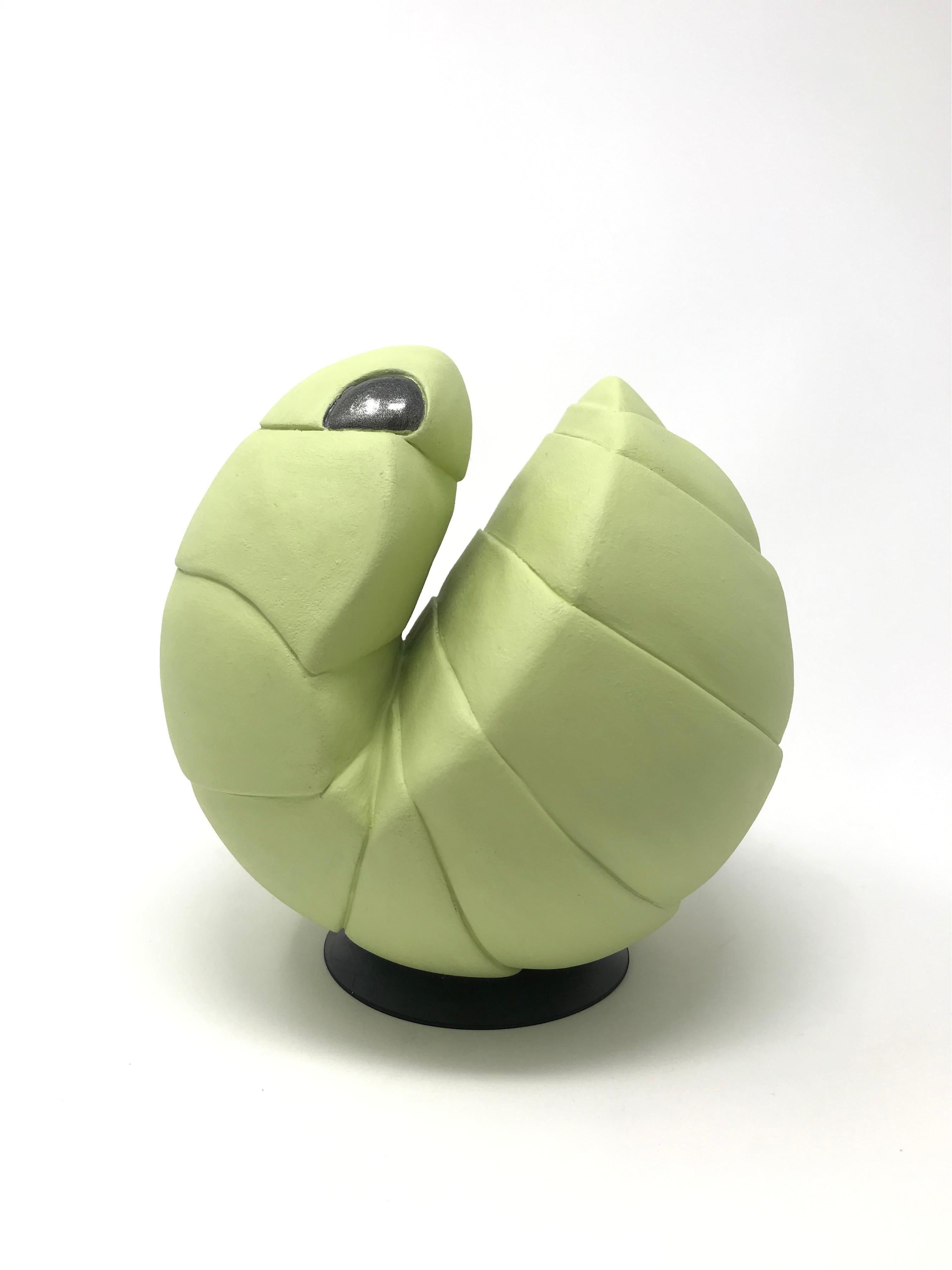 Round, soft-green, ceramic 