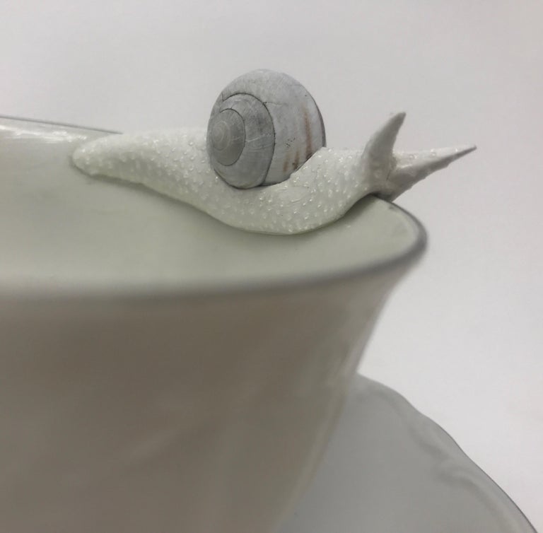 Snails on a Blue Floral Teacup 