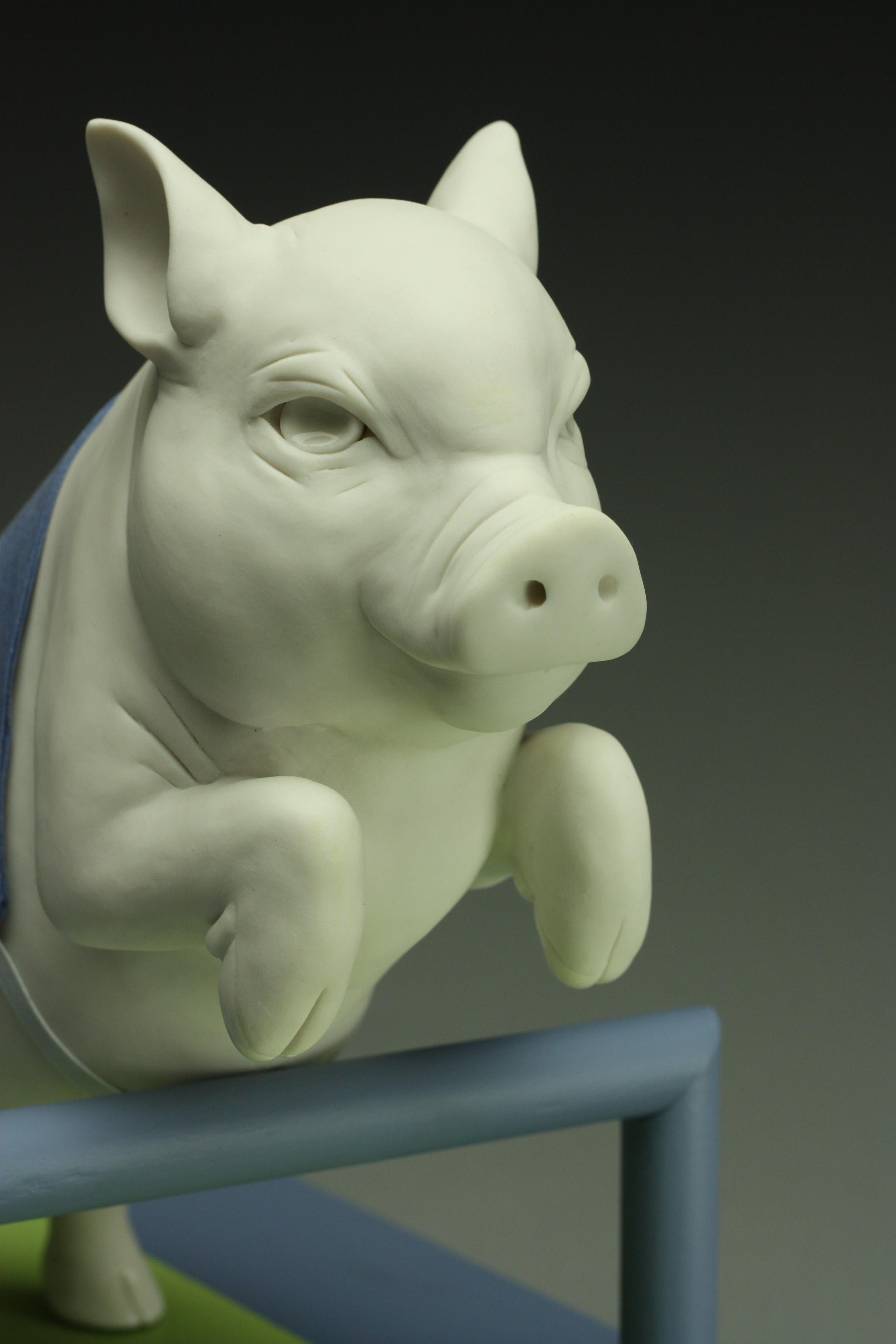 This sculpture depicts a white porcelain pig embodying sheer determination.  Hand sculpted in a super-white porcelain by New York artist Bethany Krull the gorgeous porcelain surface is left primarily unglazed except for the clear shiny glaze applied