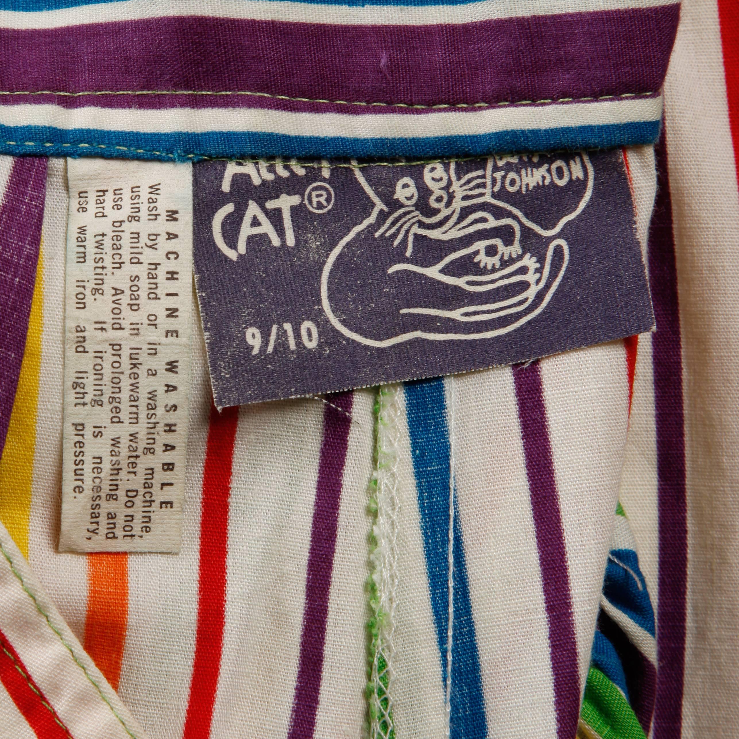 Heart-melting 1970s rainbow striped palazzo pants by Betsey Johnson for Alley Cat. Extremely rare early Betsey Johnson label is extremely collectible. These are definitely an investment piece! Wide leg and high waist with green buttons and a metal