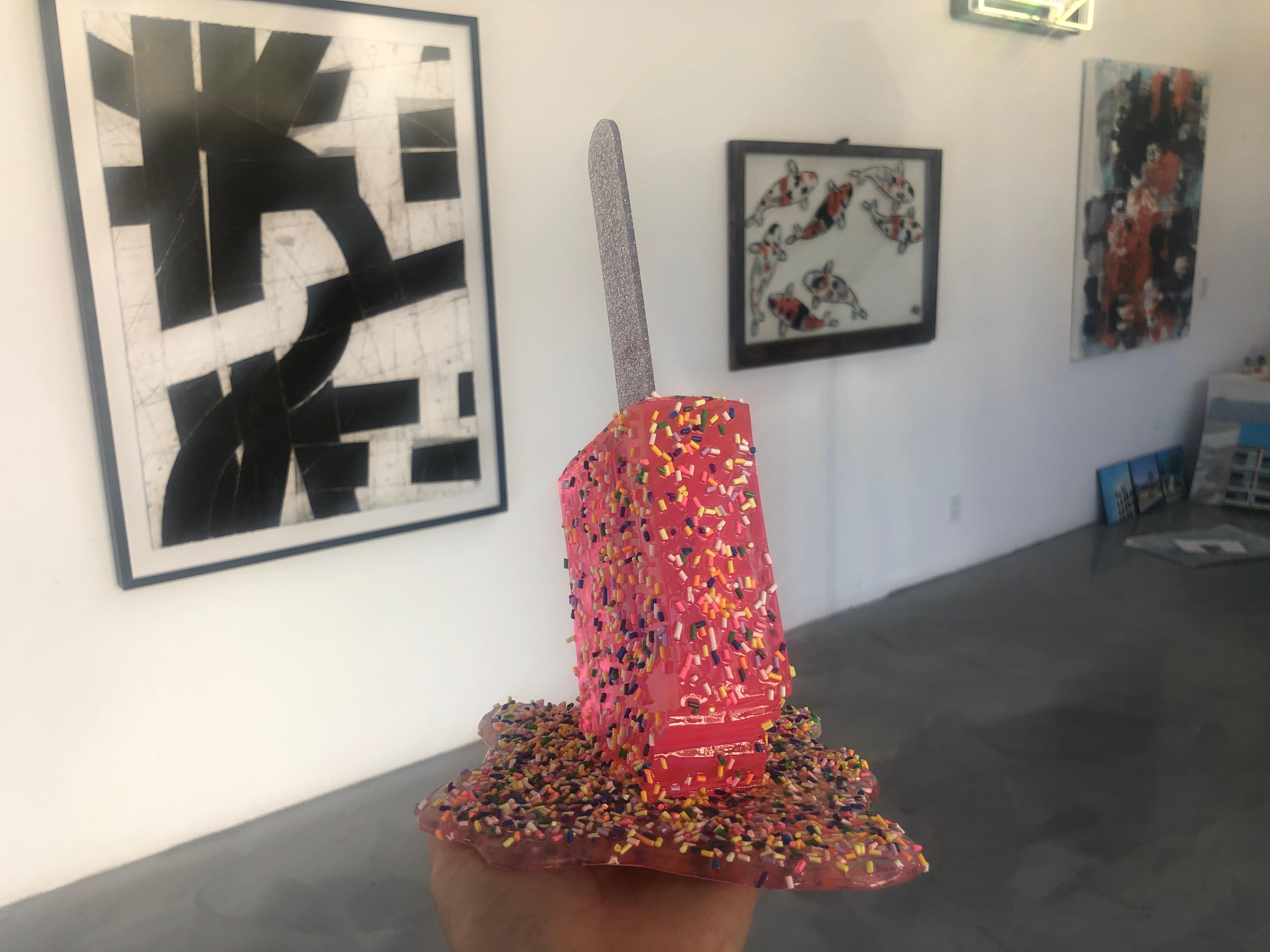  This is a one-of-a-kind resin sculpture by Betsy Enzensberger.

Betsy Enzensberger sculpts works that create a visceral longing and remembrance of the most nostalgic delights from childhood. The artist uses the familiarity of those sweet treats to