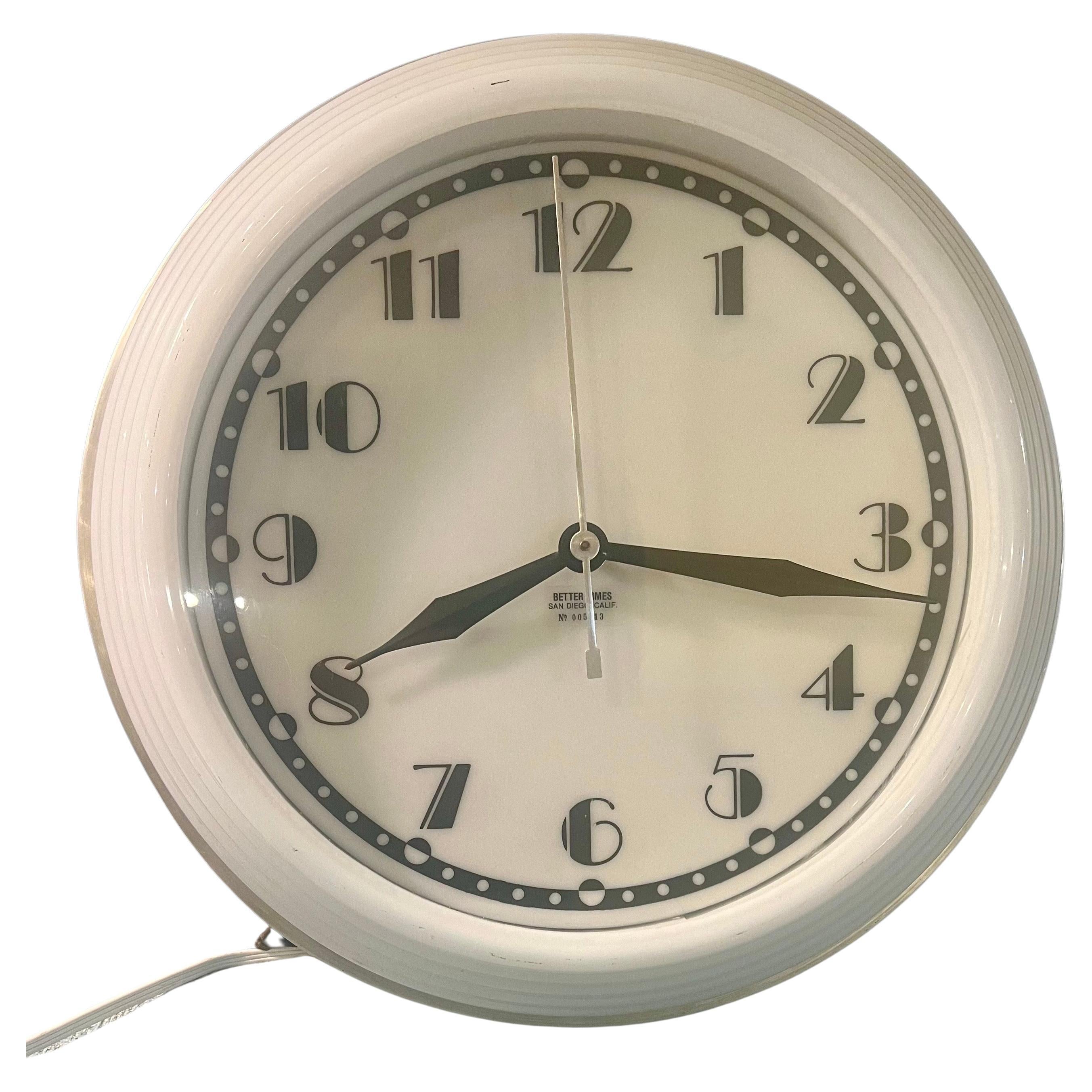 Very cool and unique Art Deco electric neon wall clock in nice working condition, circa 1970's, with separate switch for the light wall plug with long cord very nice condition recently serviced.