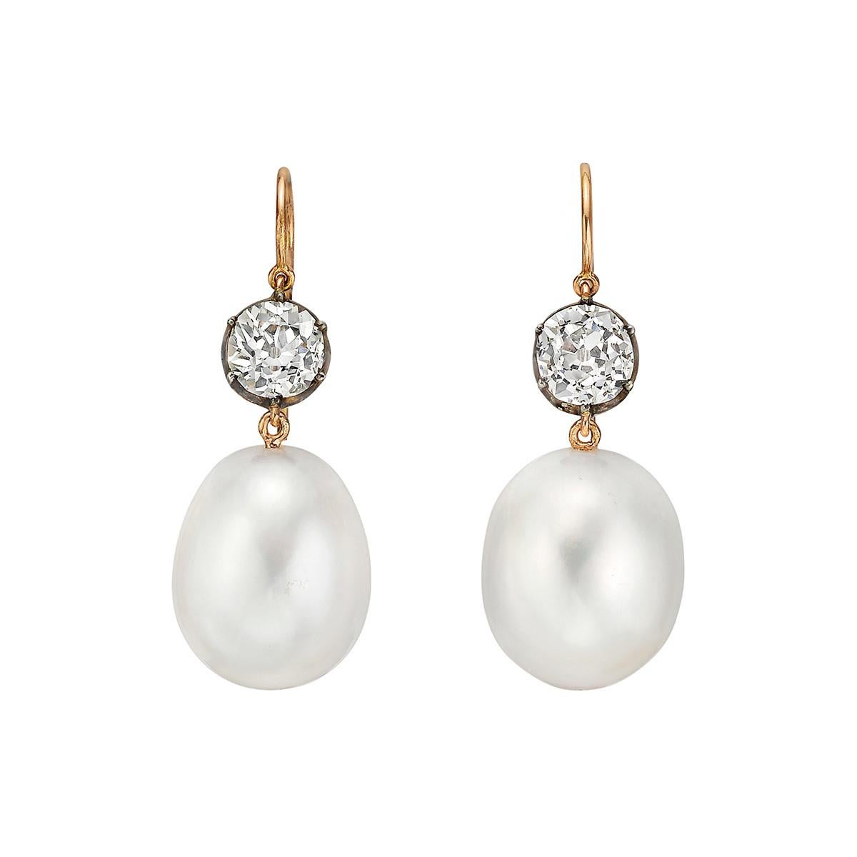 Drop earrings, featuring a cultured South Sea pearl suspended from a bezel-set old mine-cut diamond, in 18k rose gold and blackened silver.

Two diamonds weighing 2.04 total carats
French wires for pierced ears
1.34