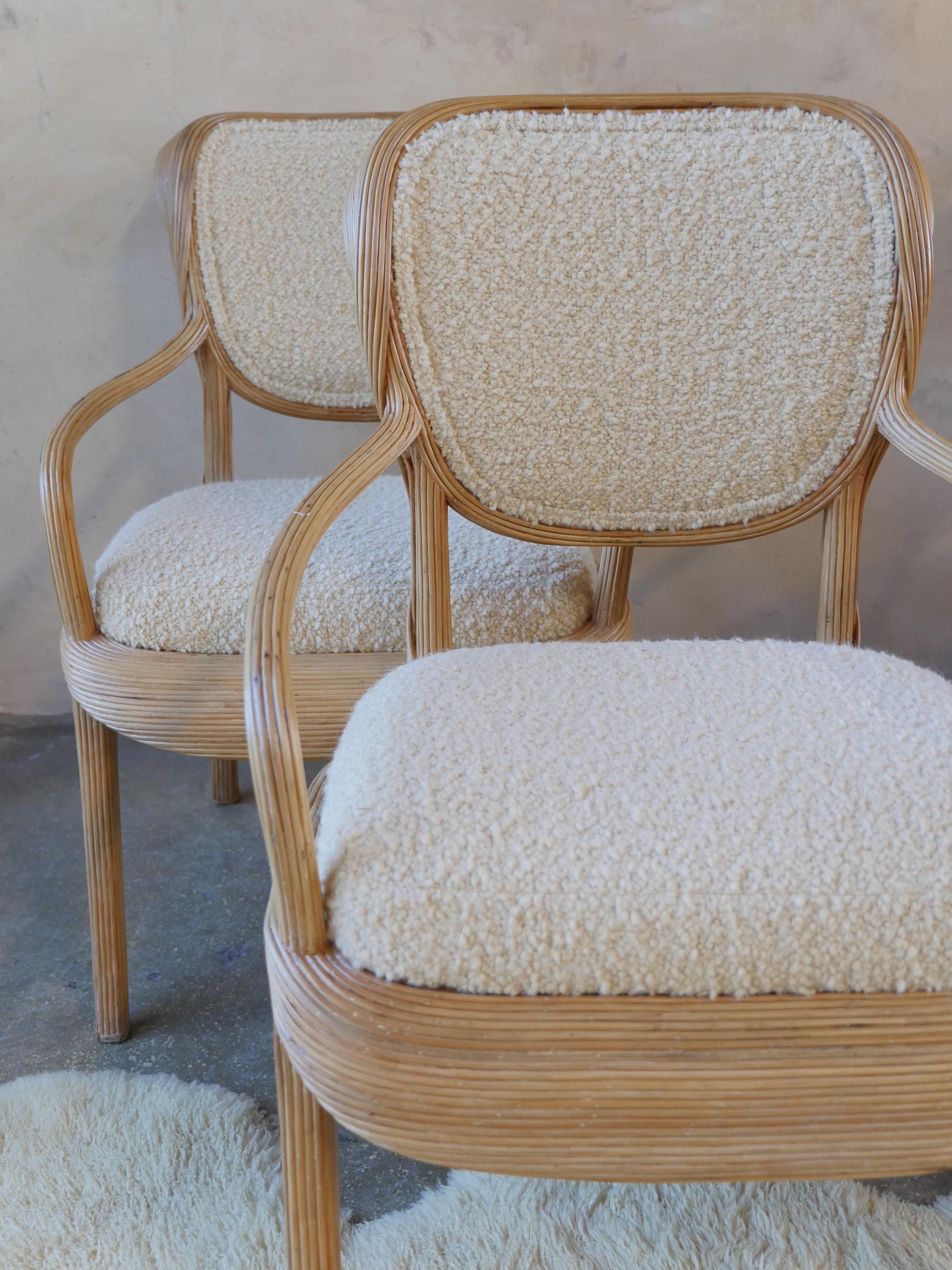 Set of four, 1980s bentwood pencil reed rattan and boucle dining chairs. These vintage chairs retain their original tags and are part of the Scultura line of furniture, by the iconic designer, Betty Cobonpue. We updated the fabric on the chairs,