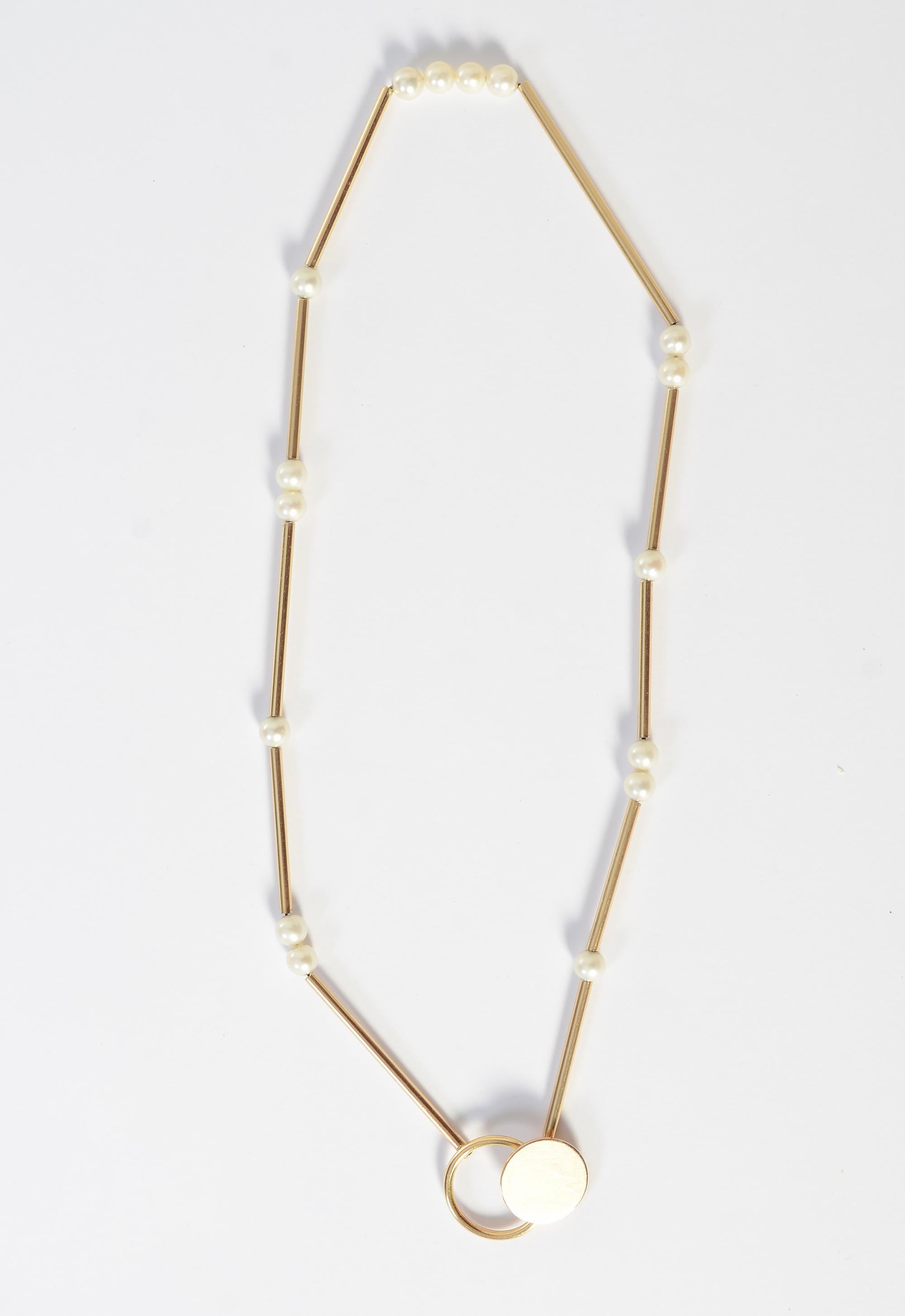 Gold and pearl choker necklace by Betty Cooke. Ninety six year old Betty Cooke is considered one of the icons of the Modernist studio jewelry movement. Her work is in the permanent collections of the Museum of Modern Art; Museum of Arts and Design