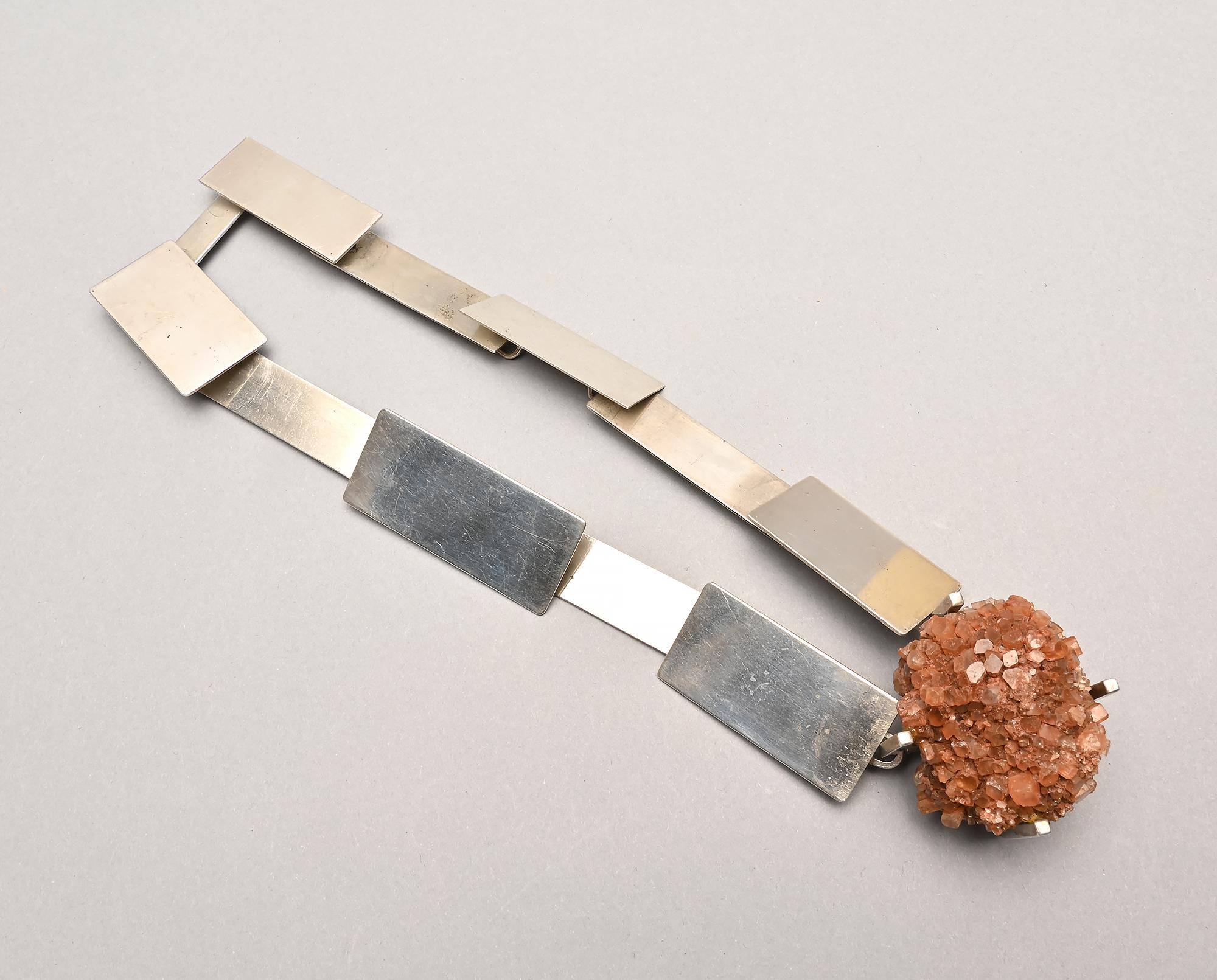 One of a kind sterling silver necklace by modernist designer, Betty Cooke. The necklace consists of eleven rectangular links of different sizes, the largest being 1