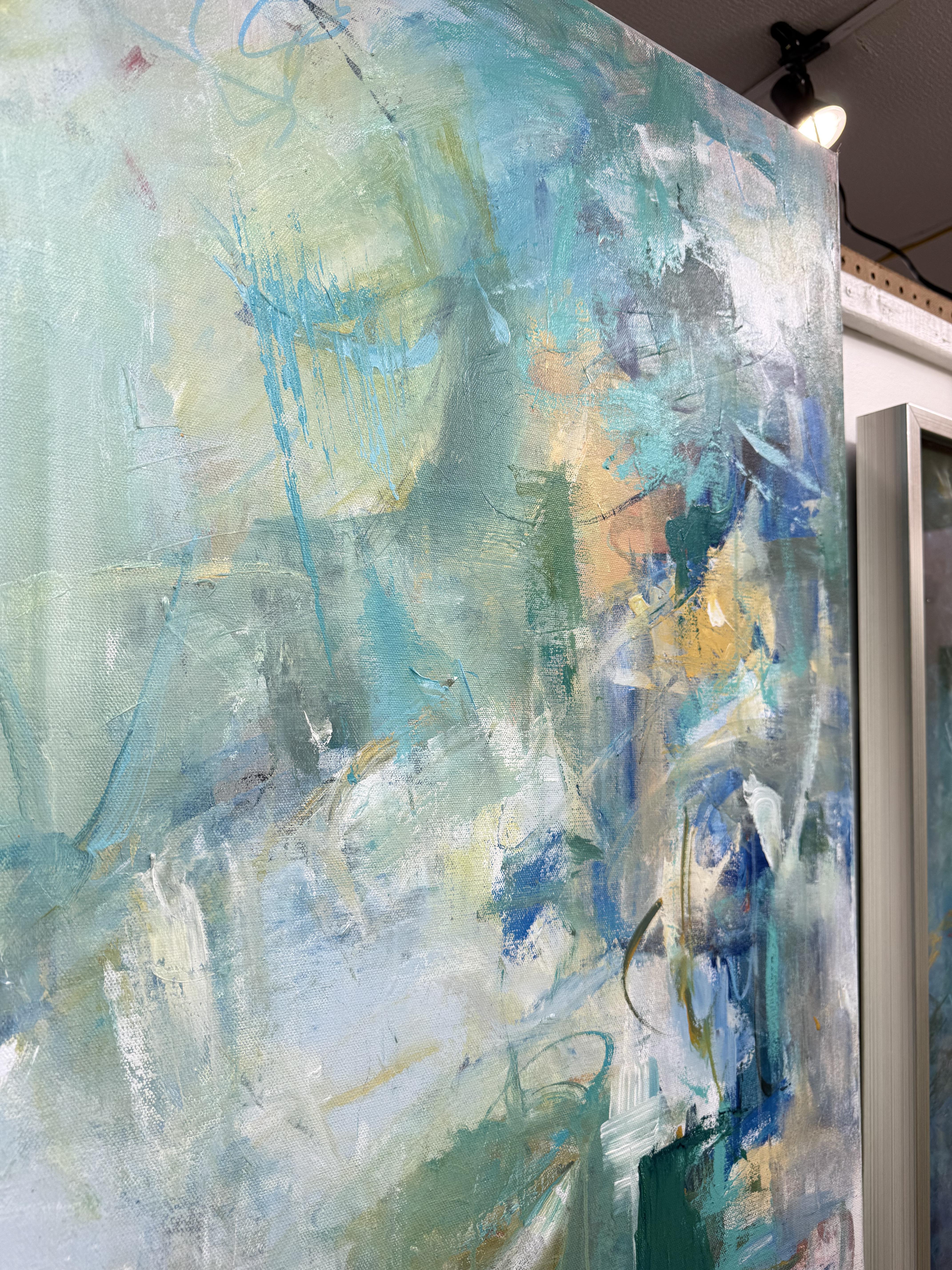 This 50x50 abstract painting captures the energy and motion of a fleeting moment, with sweeping blues and greens that create a sense of constant movement. The bold, dynamic brushstrokes draw you into the fluidity of the piece, making it a