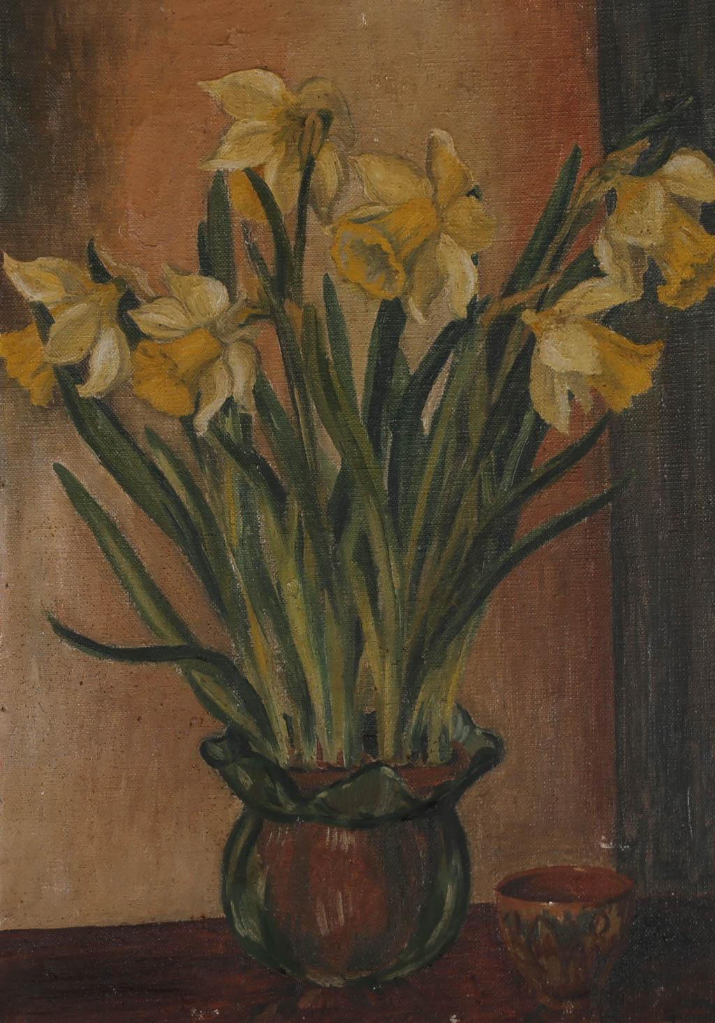 A delightful little oil study of daffodils in a glass vase. Well presented in a thick wood frame. Signed. On canvas board.
