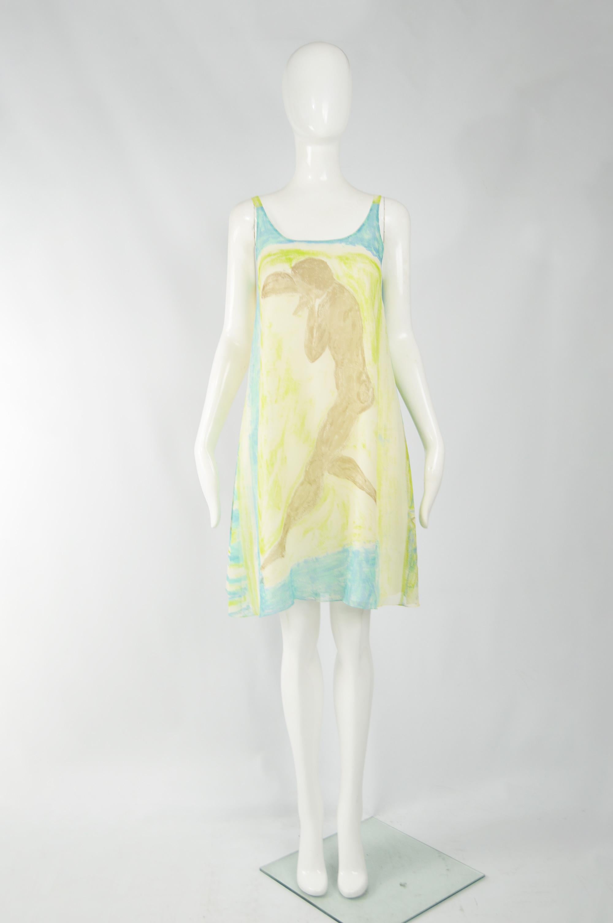 A stunning and rare vintage silk tent / shift dress from the 80s by iconic British fashion designer, Betty Jackson. In a cream silk with an abstract Matisse style print of a dancer on the front, with cute pockets to the rear.

Size: Marked UK 8