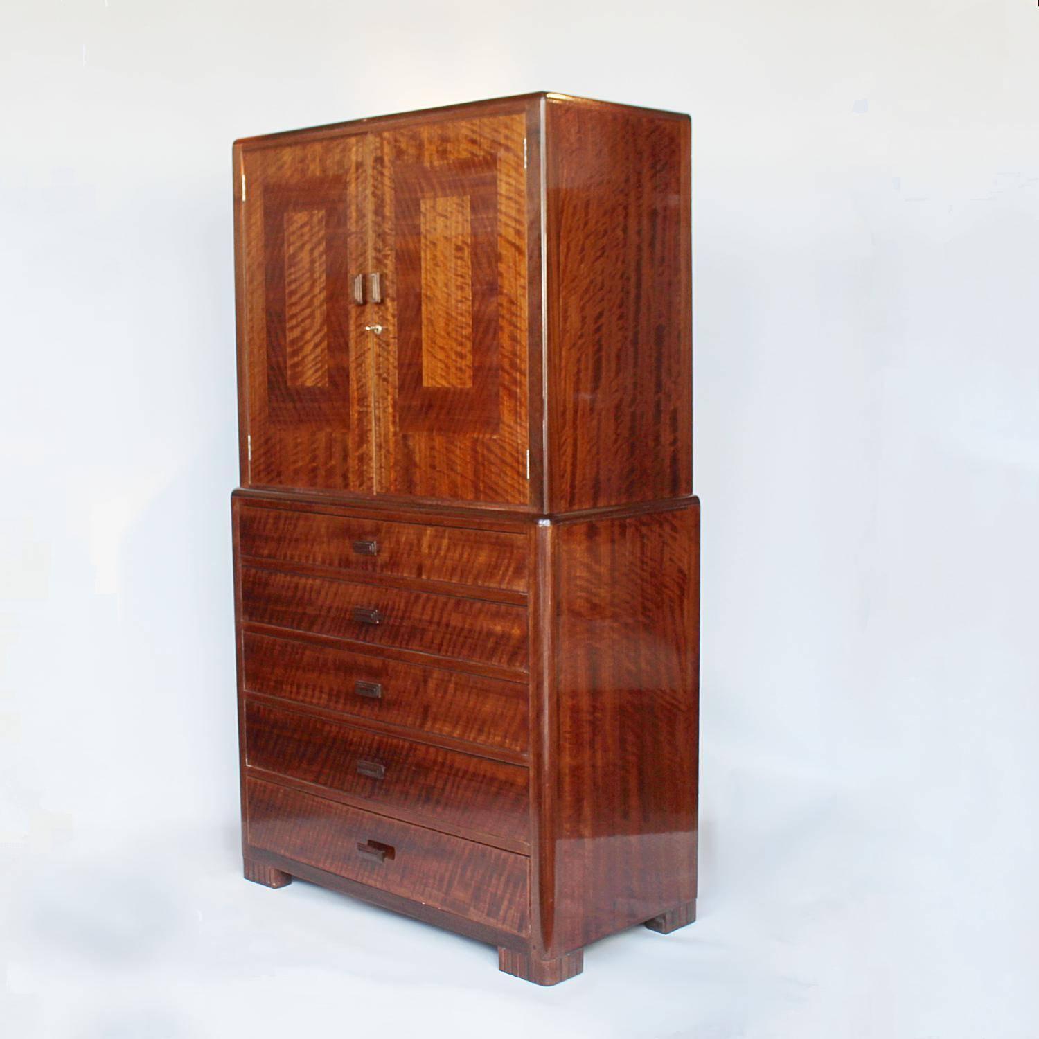 An Art Deco cabinet chest in Australian oak veneers with subtle design to top and original carved handles. Panel backed with original label.
Joel was a British furniture, textile and interior designer, active in England from circa 1921-1937. Her