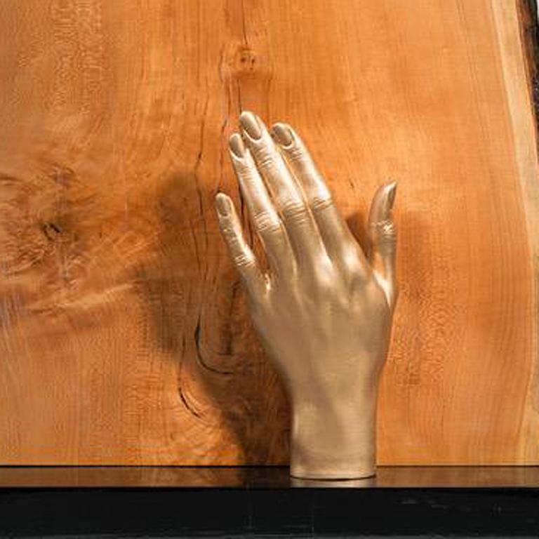 Abstract Minimal Wood Sculpture with Hand: 'Safe Keeping' - Brown Figurative Sculpture by Betty McGeehan