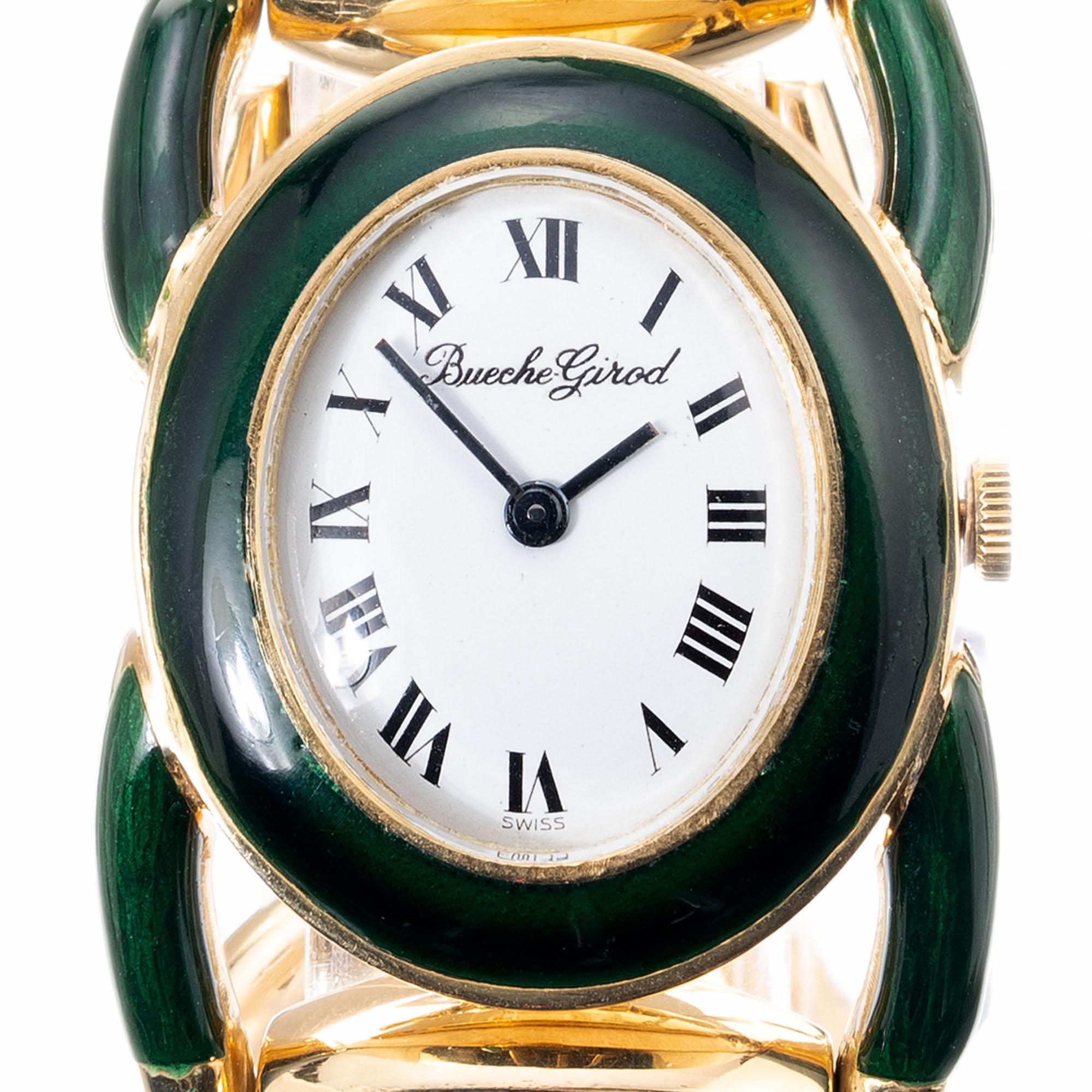 Vintage 1960's Equestrian theme 18k yellow gold green enamel wristwatch. 17 jewel manual wind movement. All original. Length 7.5 inches

Length: 42.24m
Width: 28.84mm
Band width at case: 18mm
Case thickness: 6.31mm
Band: 18k Gold
Crystal: