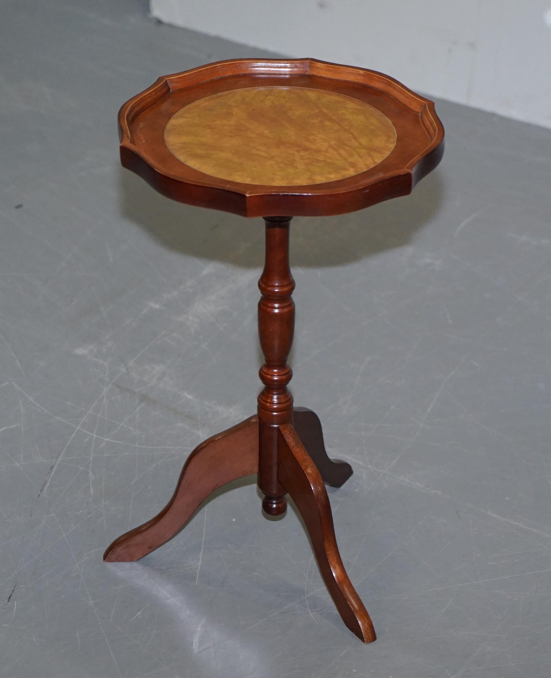 We are delighted to offer for sale this lovely small Bevan Funnell vintage light mahogany with brown leather top lamp or side table.

A good looking well made tripod table in good, we have cleaned waxed and polished it from top to bottom, there