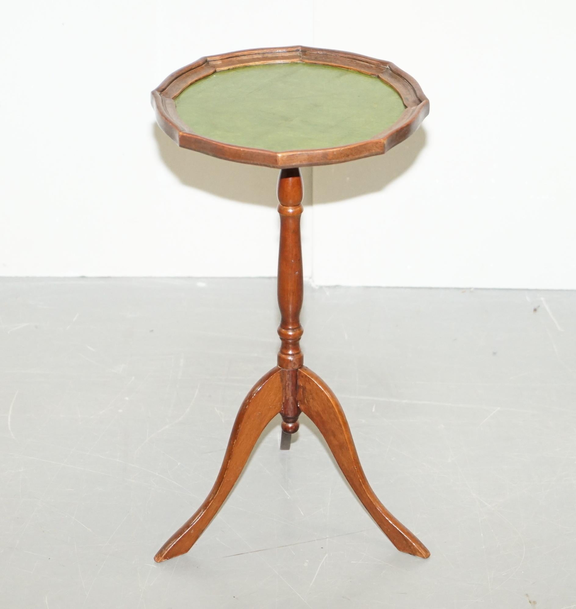 We are delighted to offer for sale this lovely Bevan Funell vintage light Mahogany with green leather top lamp or side table

A good looking well made tripod table in good, we have cleaned waxed and polished it from top to bottom, there will be