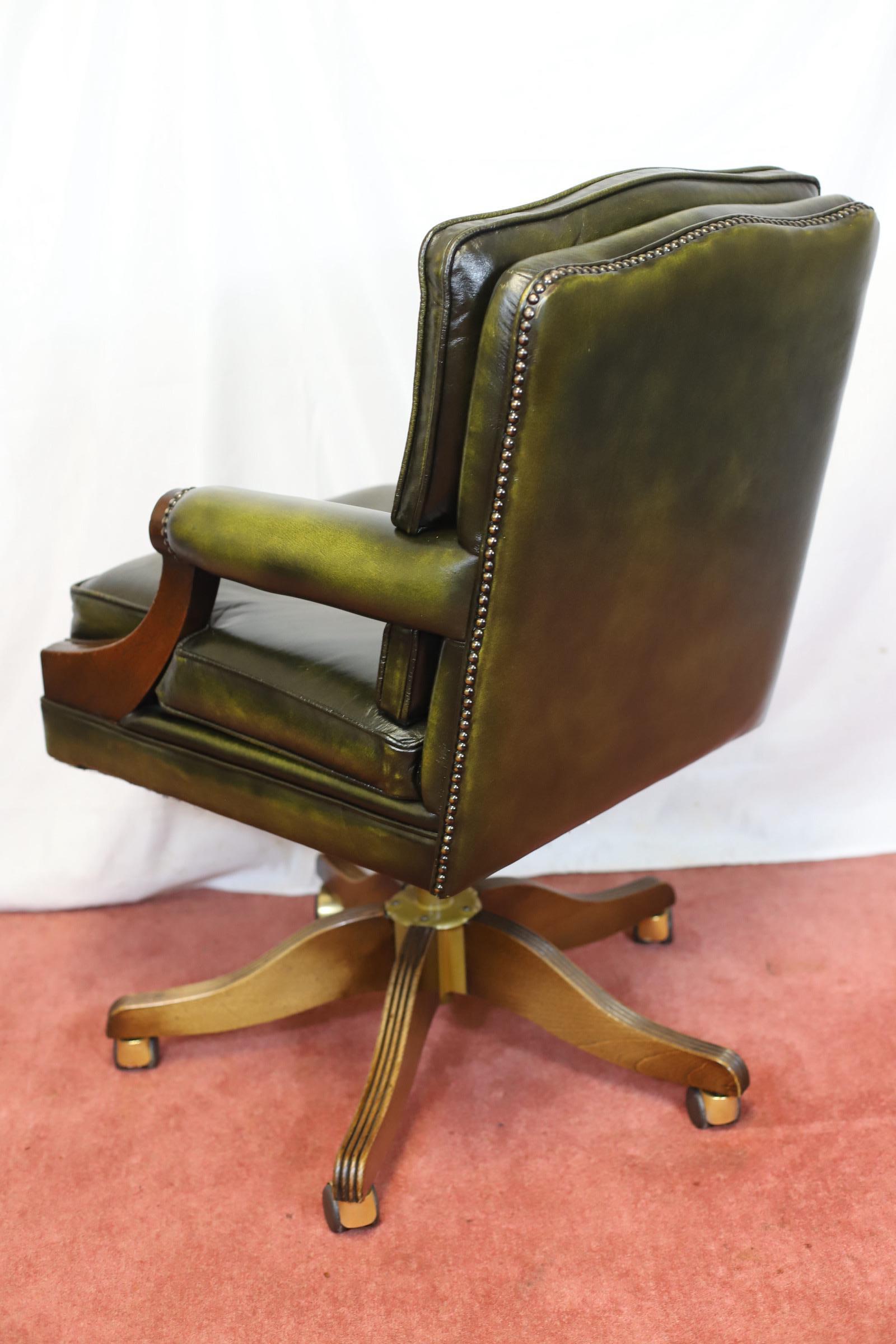 20th Century Bevan Funnel Reprodux , Stunning Walnut And Leather Swivel Chair For Sale