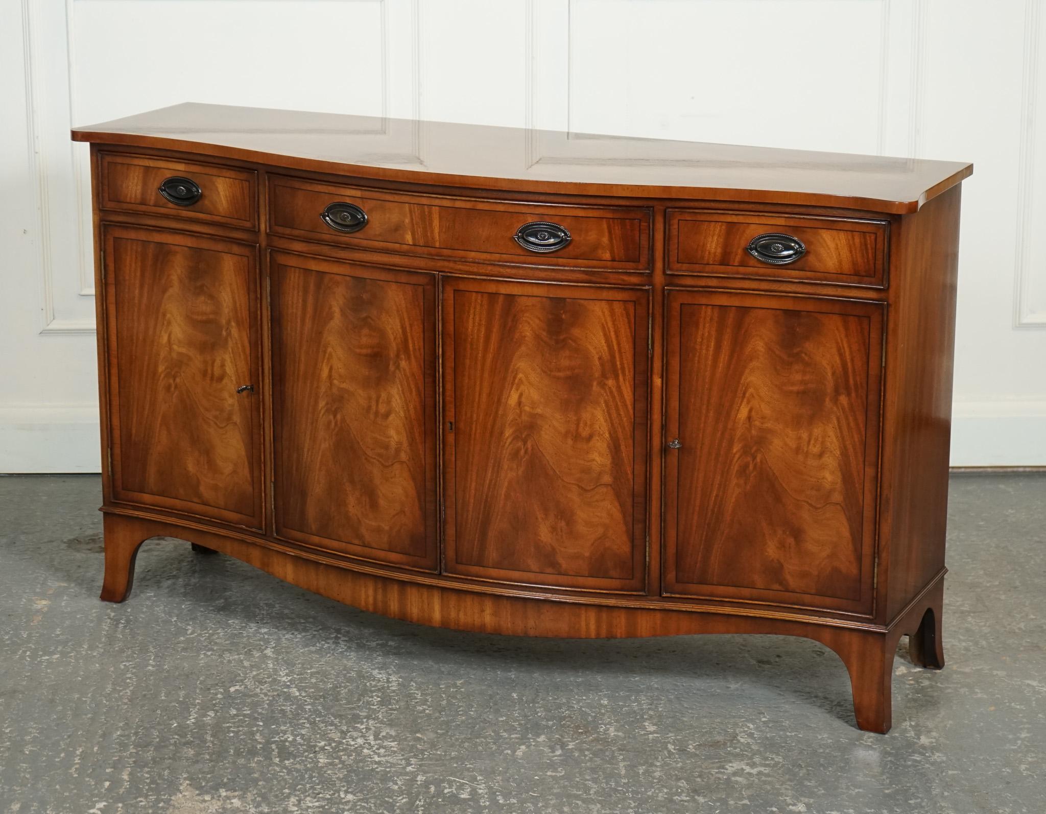 
We are delighted to offer for sale this Lovely Bevan Funnel Walnut Sideboard.

A Bevan Funnell Serpentine Georgian Style Bow Fronted Sideboard is a stunning and versatile piece of furniture that combines traditional design with practical storage