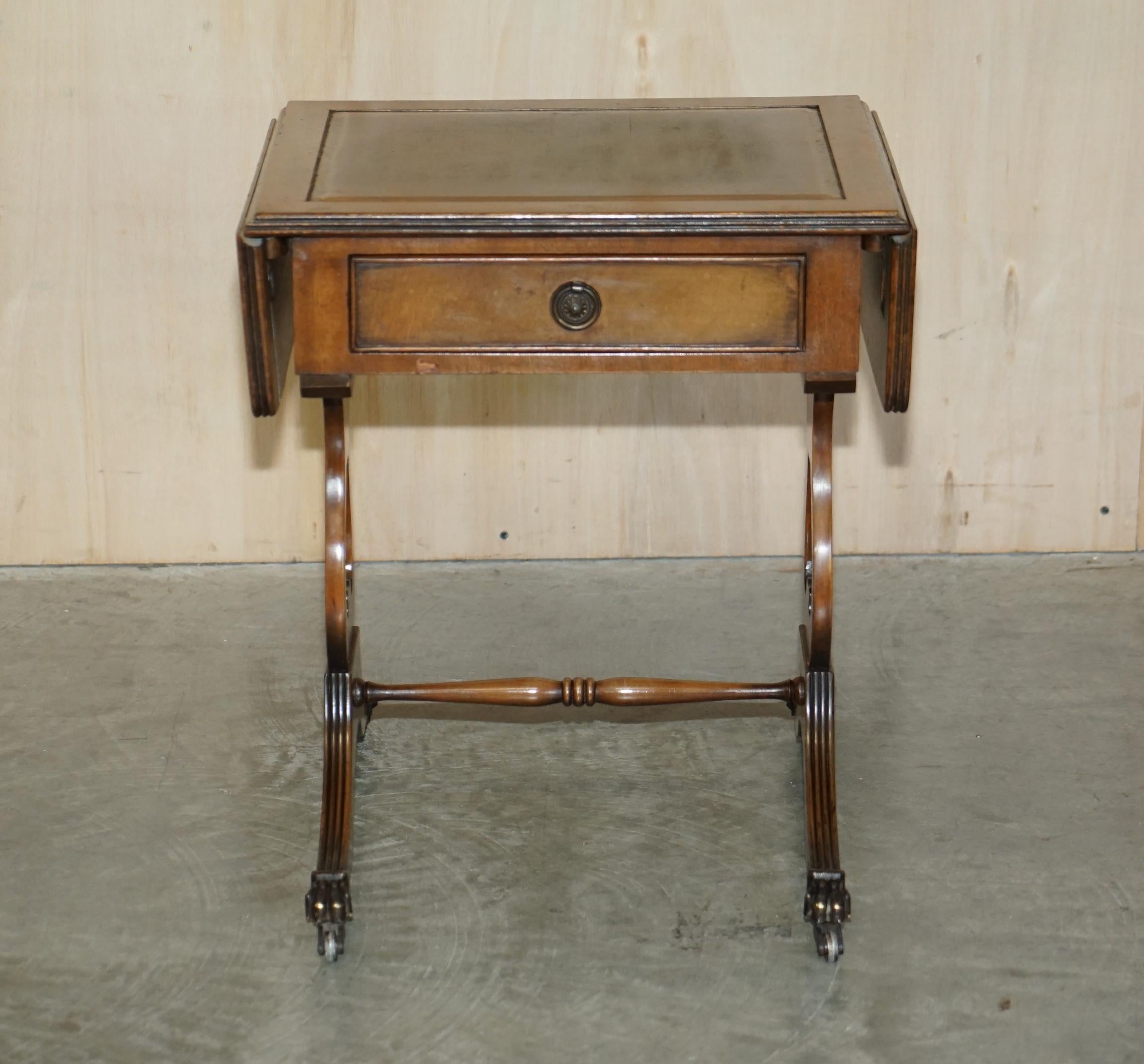 We are delighted to offer for sale this lovely Bevan Funnell vintage Mahogany side table with extending brown leather top and single drawer.

A very good looking and versatile piece, the table has single drawer to the front, the middle top is wood