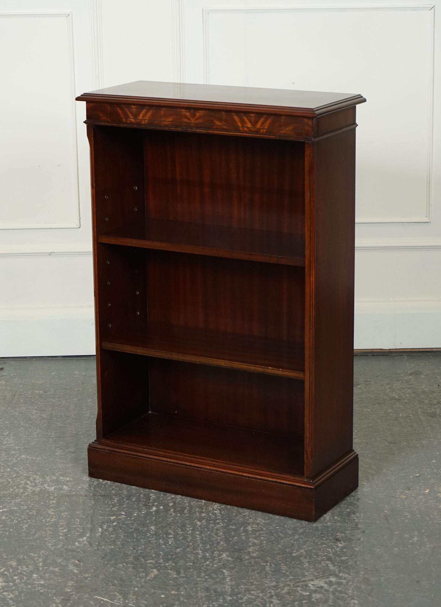 
We are delighted to offer for sale this Bevan Funnell Georgian Style Open Dwarf Bookcase

The Bevan Funnell Georgian Style Open Dwarf Bookcase is a beautiful piece of furniture crafted in the Georgian style. It features an open design with
