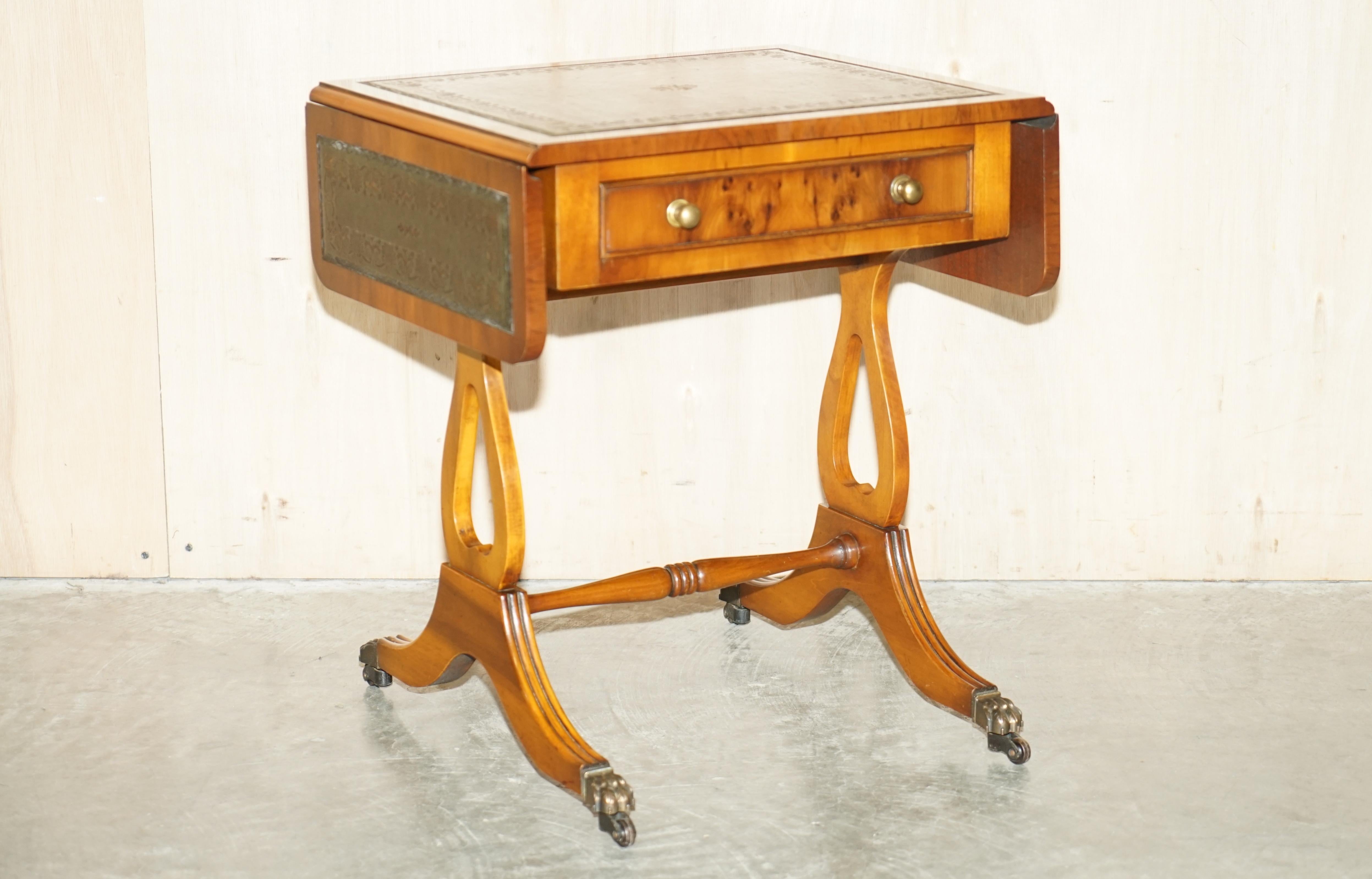 We are delighted to offer for sale this lovely condition vintage Bevan Funnell green leather and Burr Yew Wood extending side table.

This is a very well made and versatile piece with a timber patina to die for, its burr Yew with a green leather