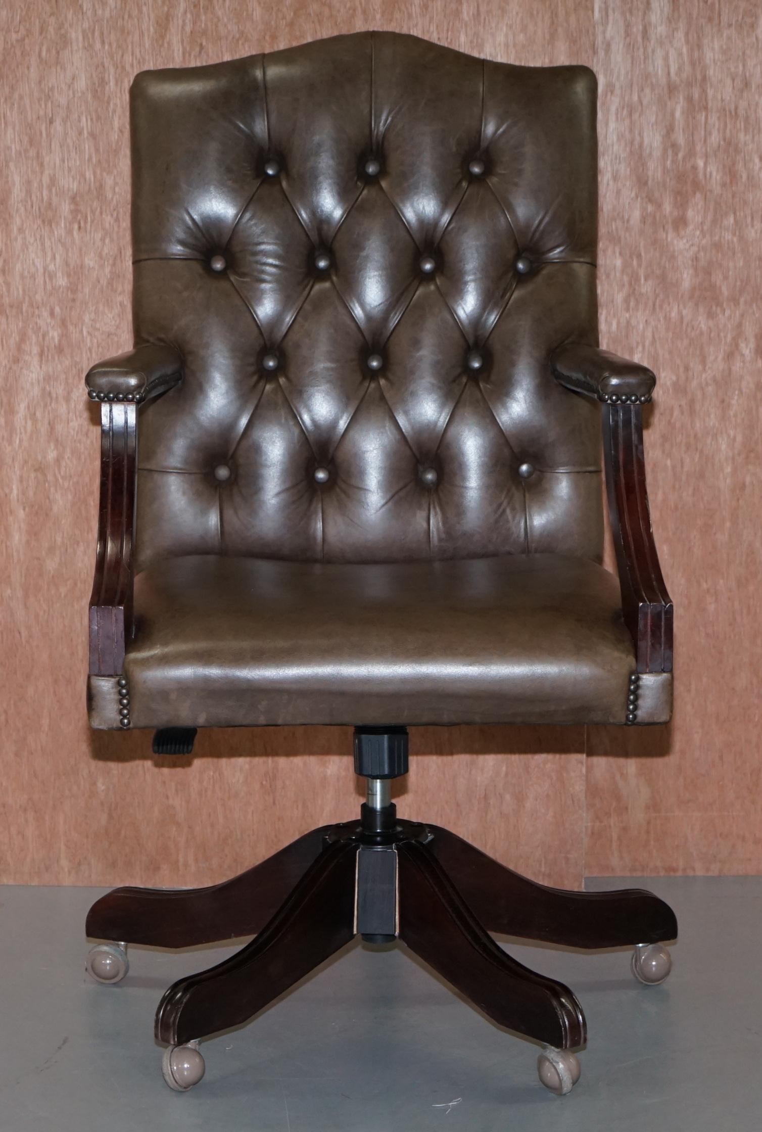 We are delighted to offer for sale this very comfortable RRP £3800 Bevan Funnell heritage grey leather directors chair with Chesterfield tufted buttoning

A good looking and handmade in England chair. Upholstered with grey heritage leather, the
