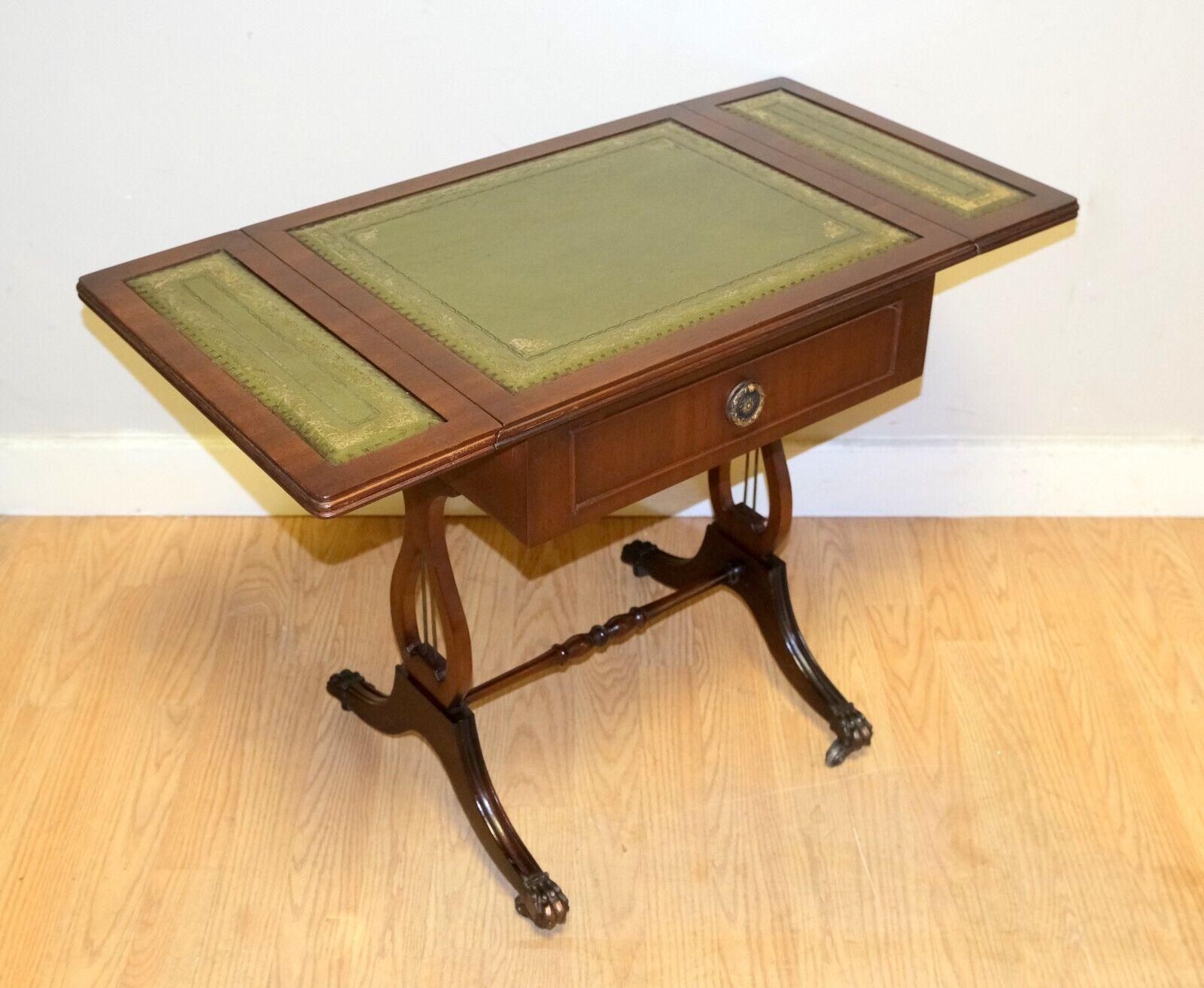 We are delighted to offer for sale this lovely Bevan Funnell brown mahogany extendable green leather top side end lamp card table.

A well made, rich Mahogany colour and good looking side table from the well known British furniture maker, Bevan