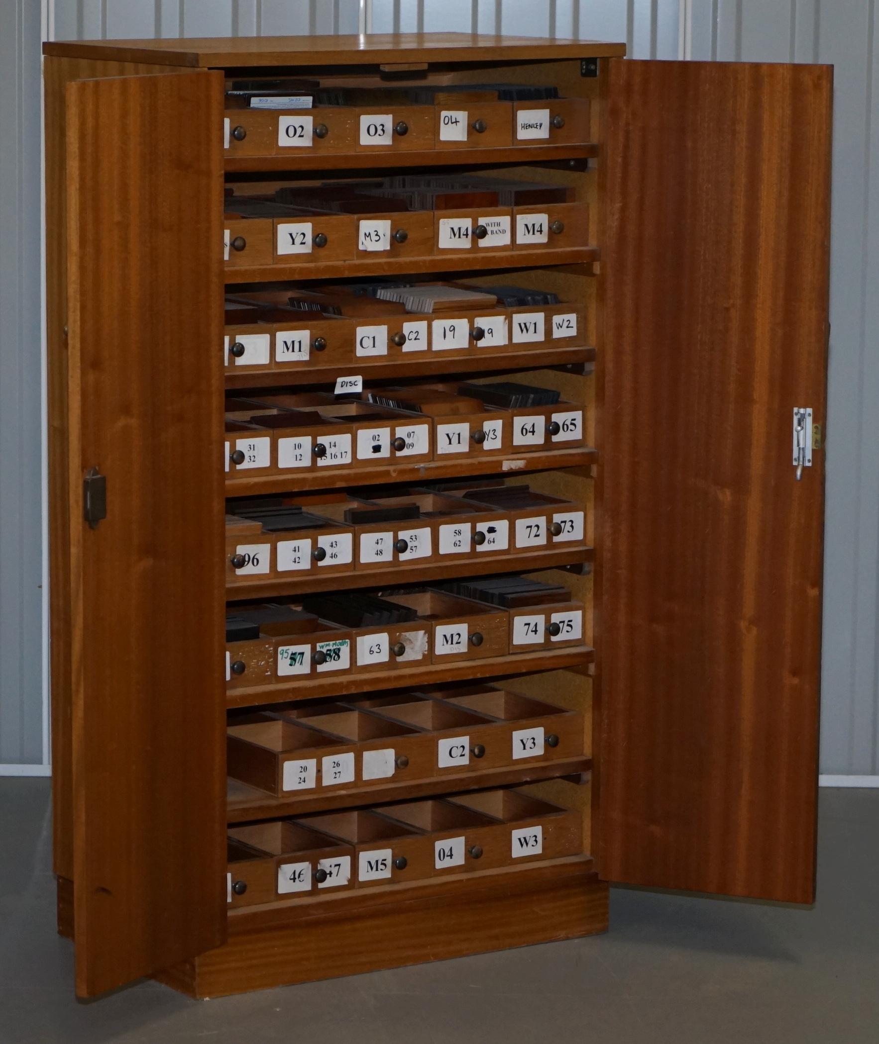 We are delighted to offer for sale this original Vintage wood sample cabinet from Bevan Funnell

This cabinet has hundreds of wood samples in all kinds of woods, Burr walnut, Yew, Mahogany and so on, they were used to send out to customers as
