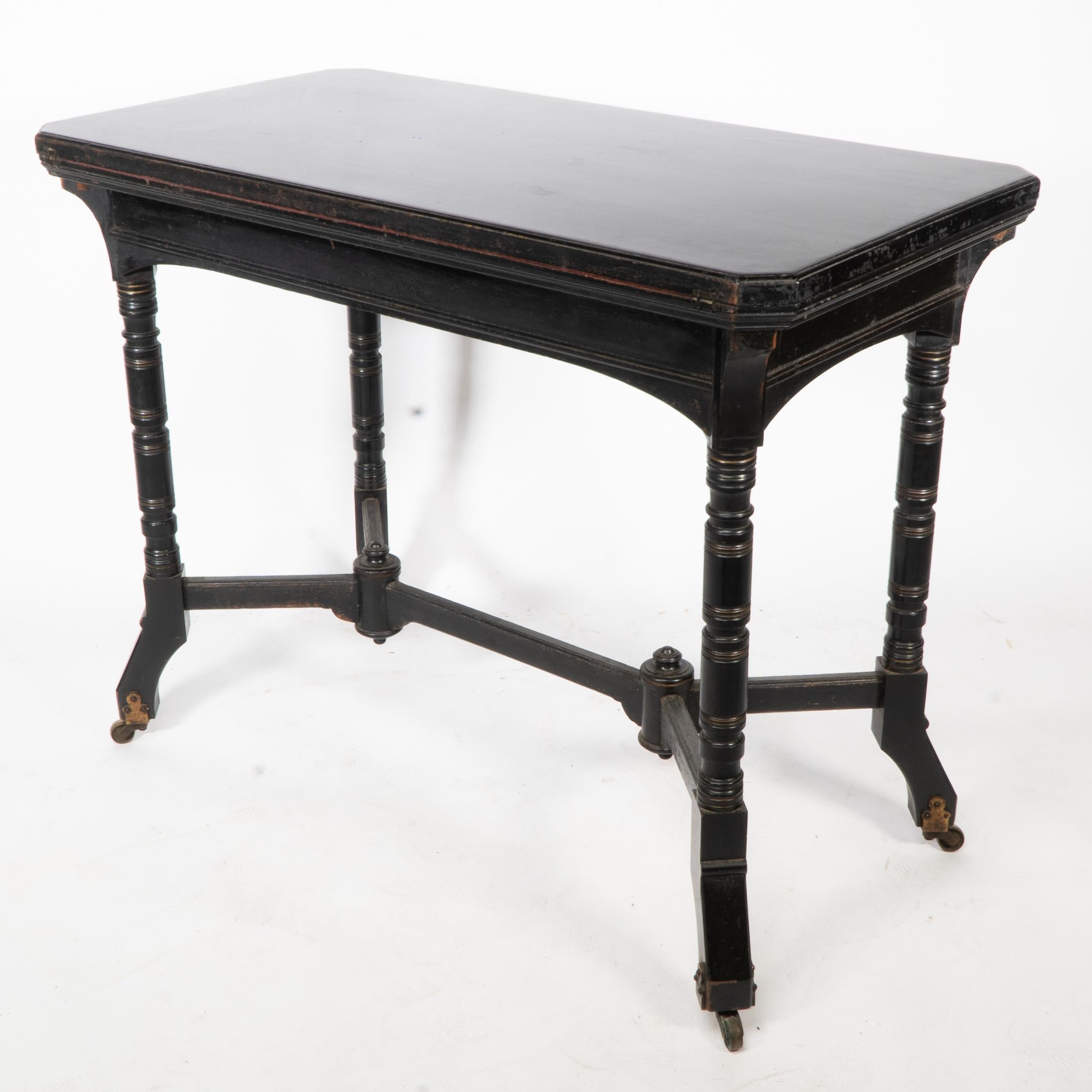 English Bevan. Marsh Jones & Cribb. An Aesthetic Movement walnut ebonized card table For Sale