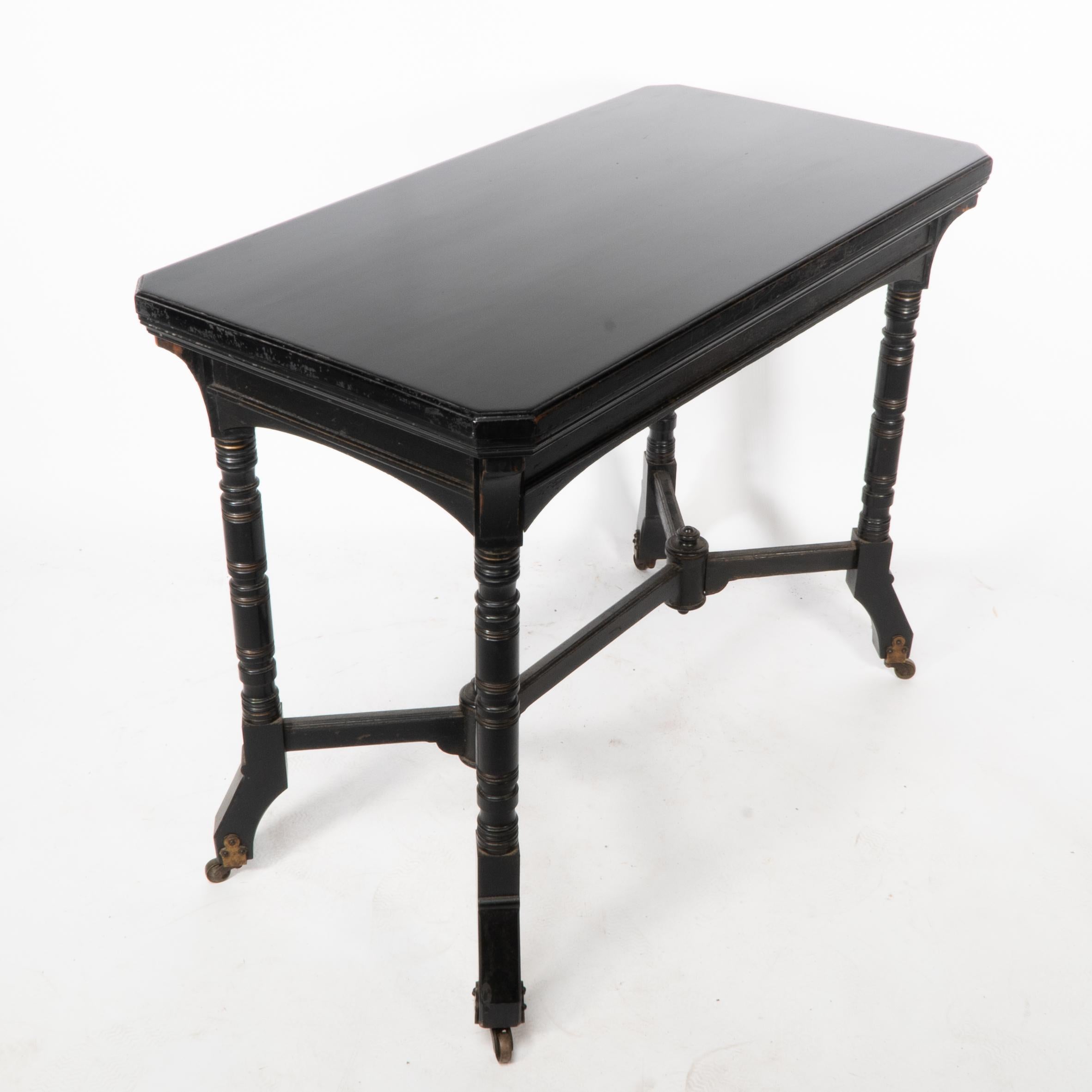 Bevan. Marsh Jones & Cribb. An Aesthetic Movement walnut ebonized card table In Good Condition For Sale In London, GB