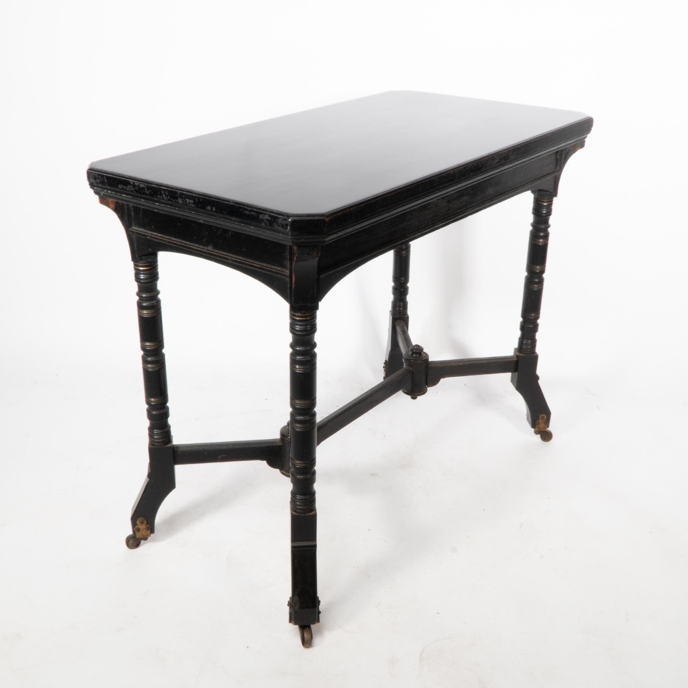 Walnut Bevan. Marsh Jones & Cribb. An Aesthetic Movement walnut ebonized card table For Sale