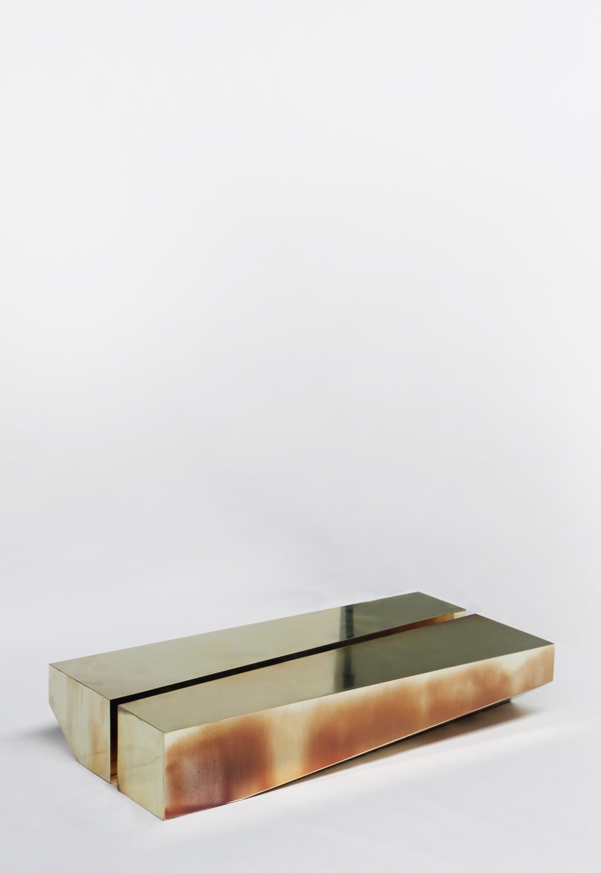 Bevel Coffee Table by ​Hadge
Limited Edition of 10
Dimensions: D 39 x W 150 x H 26 cm.
Materials: Steel polished chrome bronze brass 

Weathered by hand (unique pieces).

HADGE - an architecture I interior practice founded in 2020 by architect