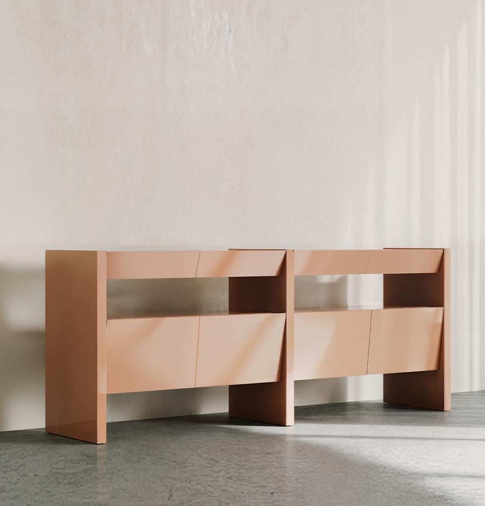 The Bevel console has been redefined through its elevated structure, introducing a new interpretation of its signature form. The addition of drawers at the top and an open shelf below seamlessly merges storage with display, enhancing both its