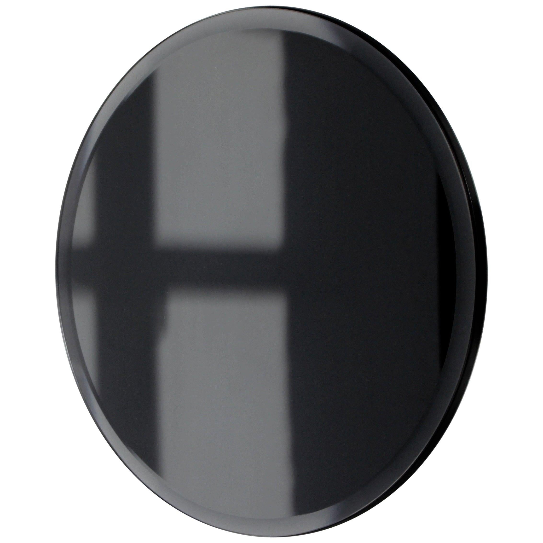 Orbis Bevelled Black Tinted Round Frameless Mirror Faux Leather Backing, Medium For Sale