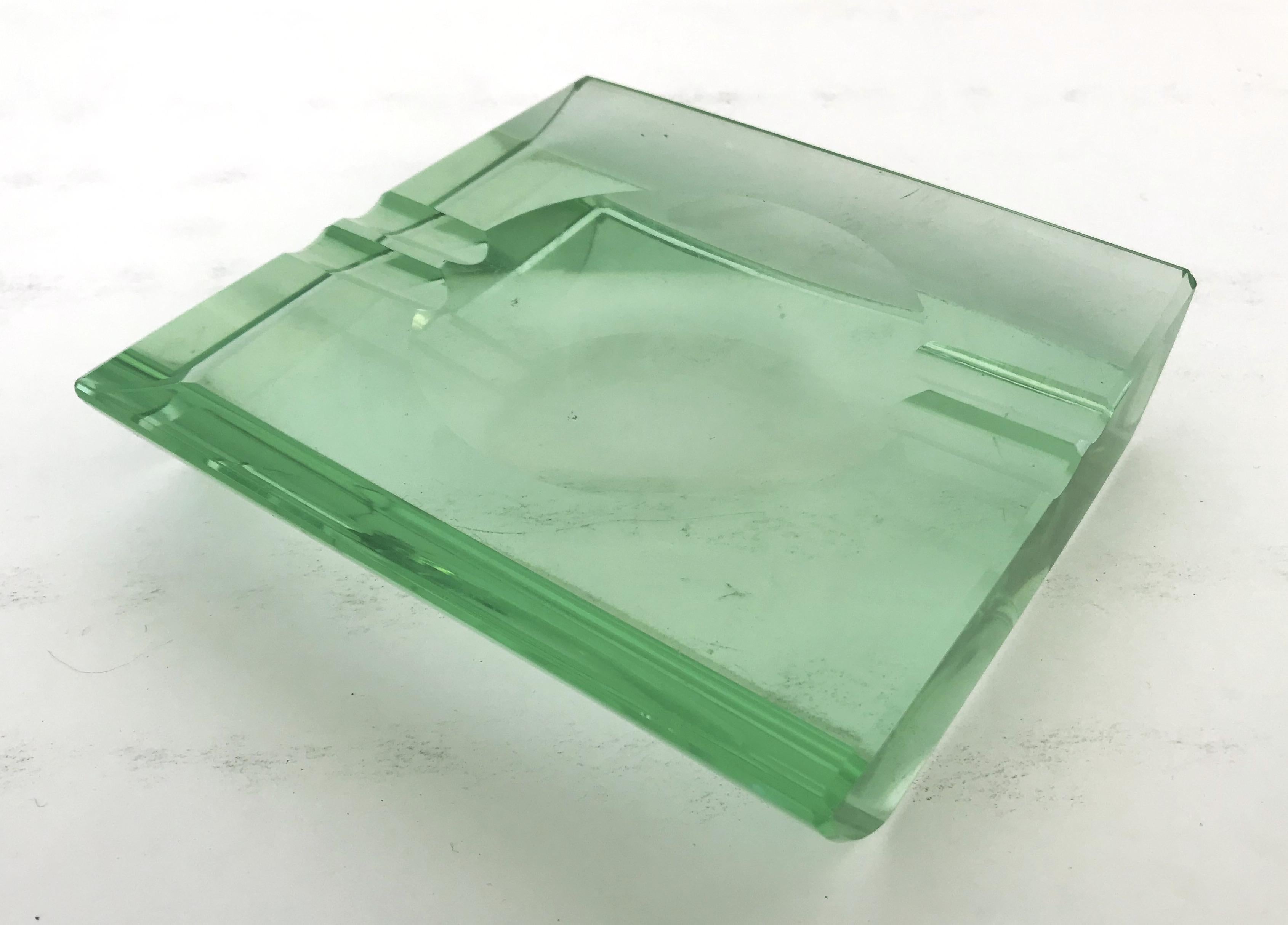 Vintage midcentury Italian beveled glass ashtray by Fontana Arte / Made in Italy circa 1960s
Measures: length 5 inches, width 5 inches, height 1 inch
1 in stock in Palm Springs ON 20% OFF SALE for $719 !!!
Order Reference: FABIOLTD G166
This piece