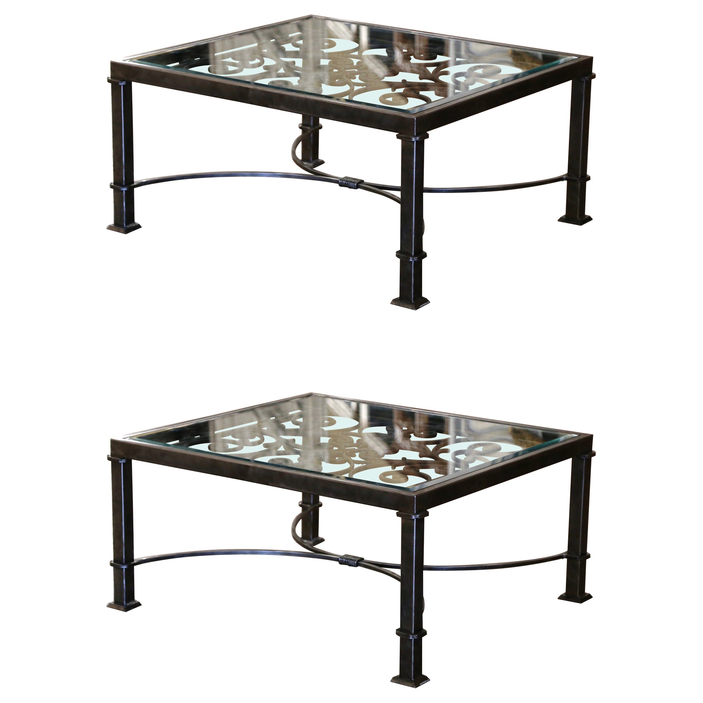 This large coffee table base was crafted using two ornate antique gates from France. The elegant table stands on four square legs over the antique window balcony gate from Provence, circa 1820. The heavy forged balcony gates welded together, are