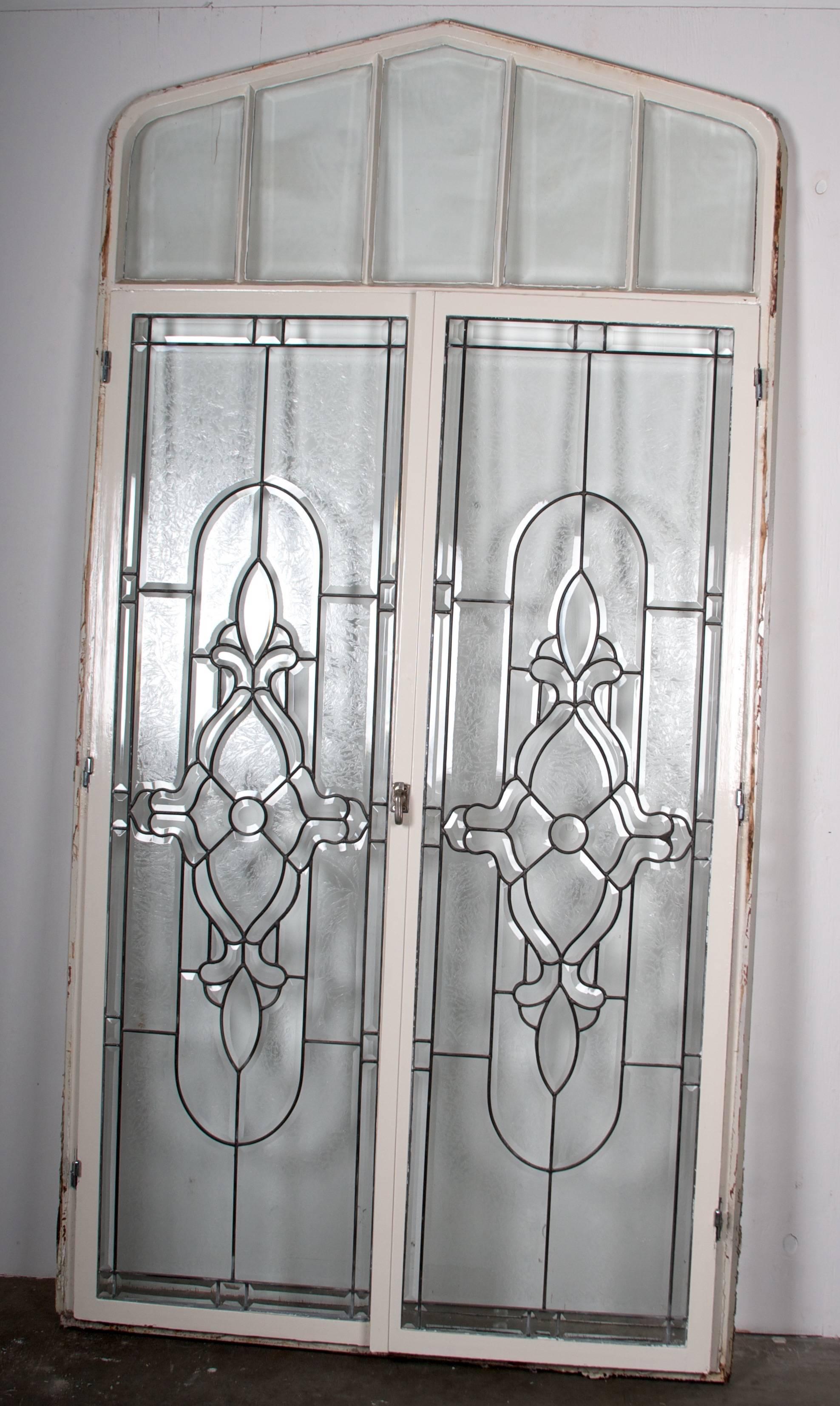 This is a series of beveled and lead trimmed windows, with wonderful bevels, partially
