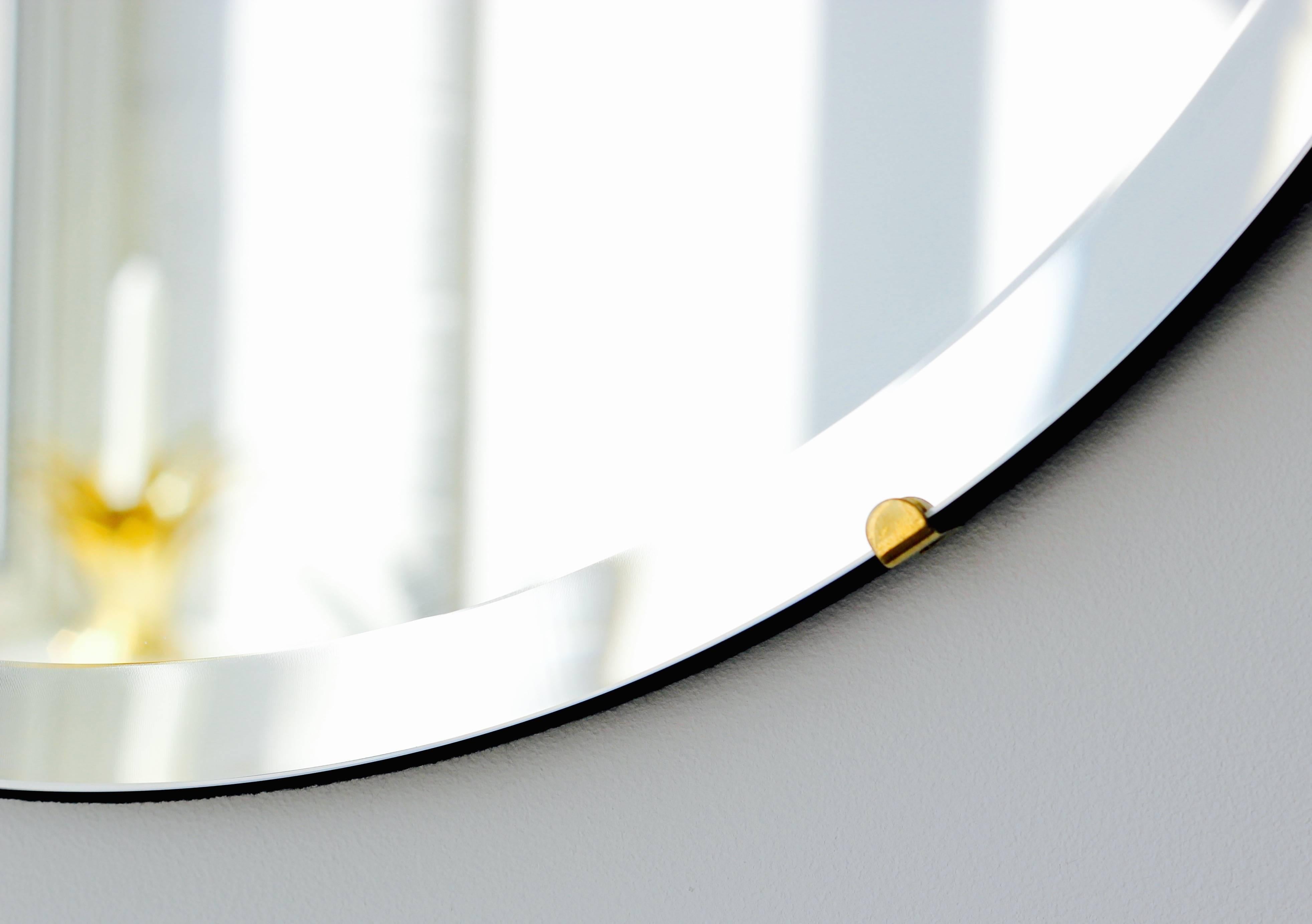 Orbis Runder rahmenloser, abgeschrägter Art Deco Mirror mit Clips aus Messing, klein (Abgeschrägt) im Angebot