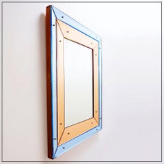 Beveled wall mirror with blue and copper mirror panels - Italy 1930s